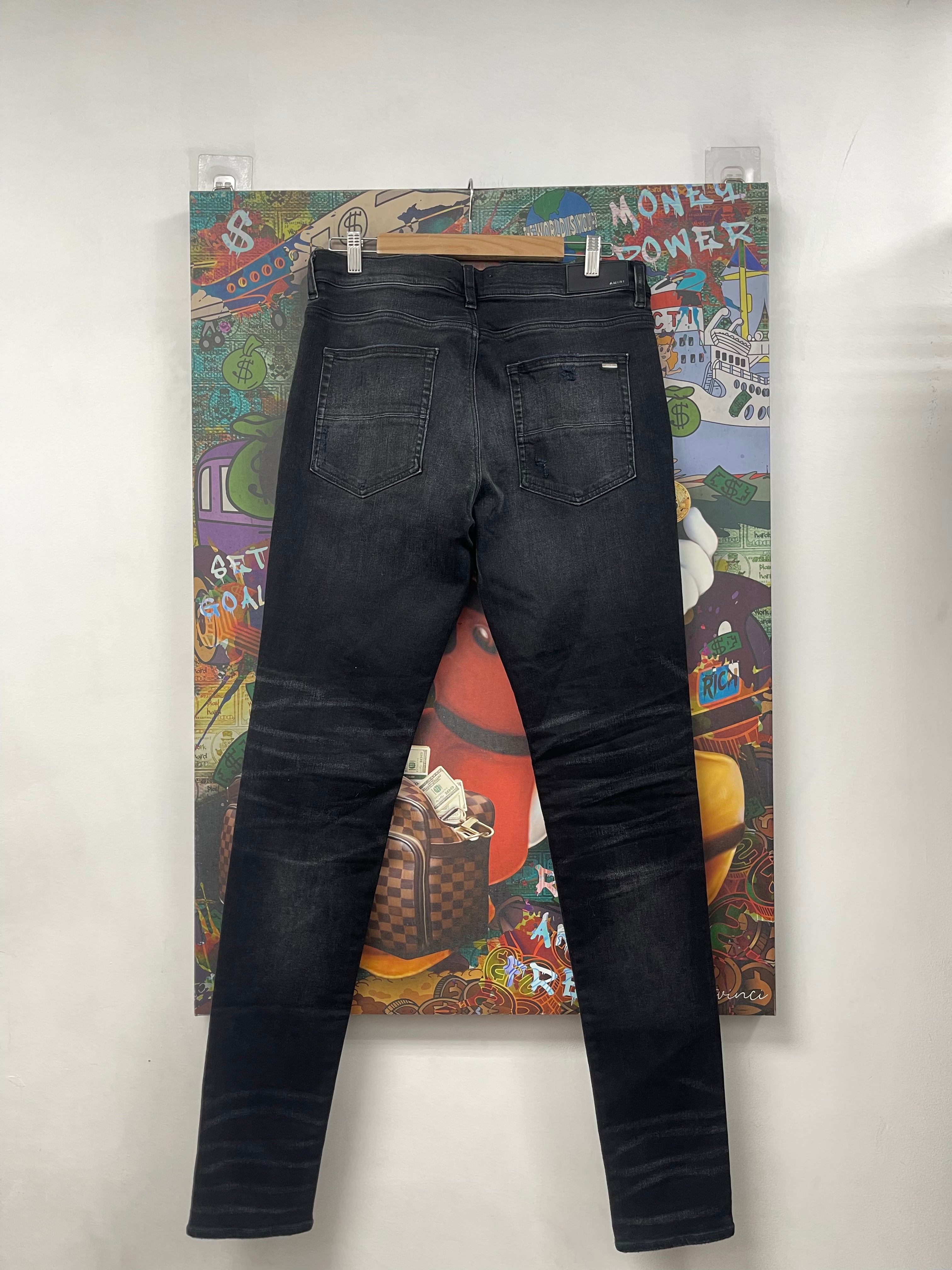 Amiri MX1 Black Wash Blue Crackle Patch Jeans
