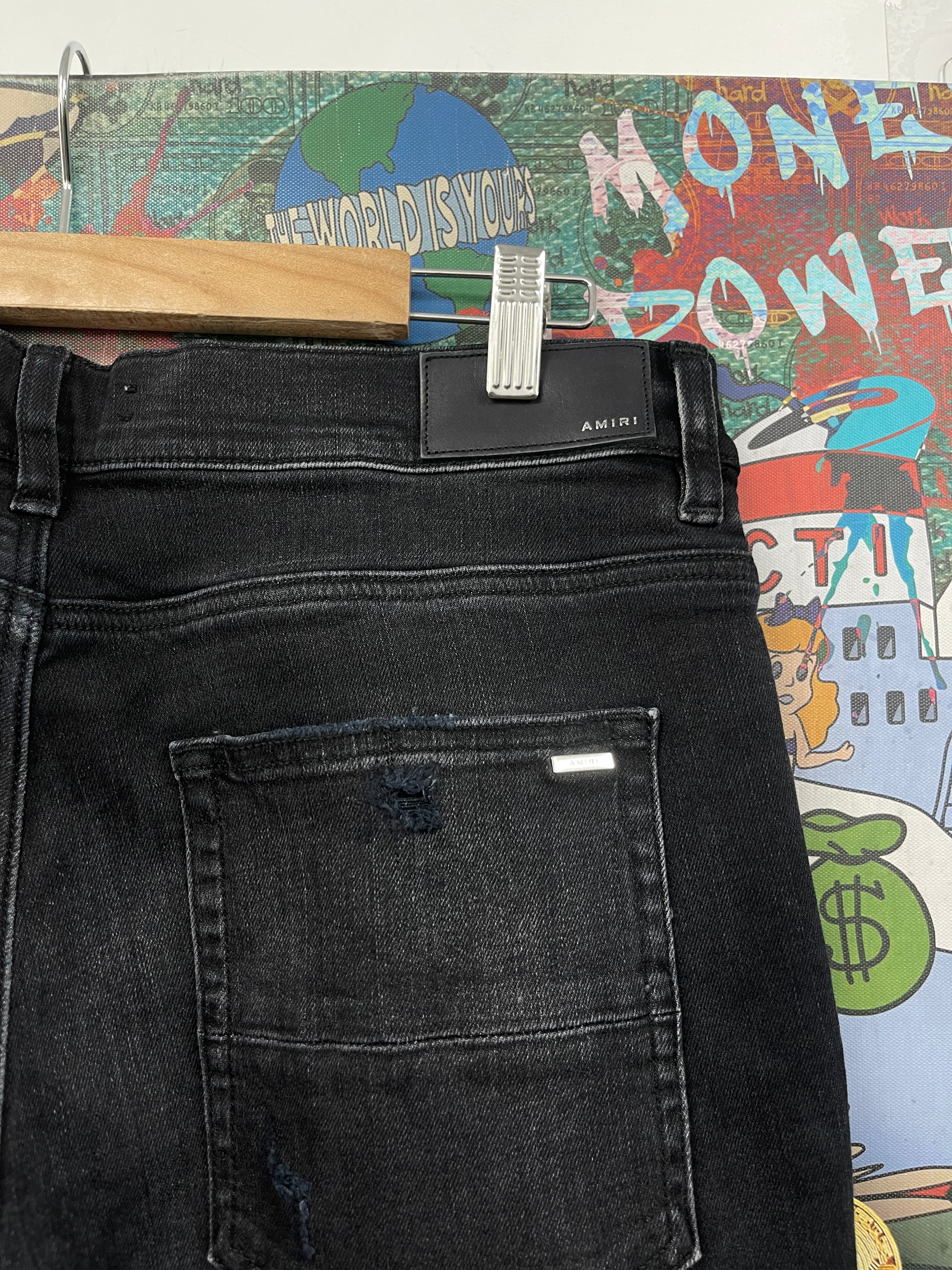 Amiri MX1 Black Wash Blue Crackle Patch Jeans