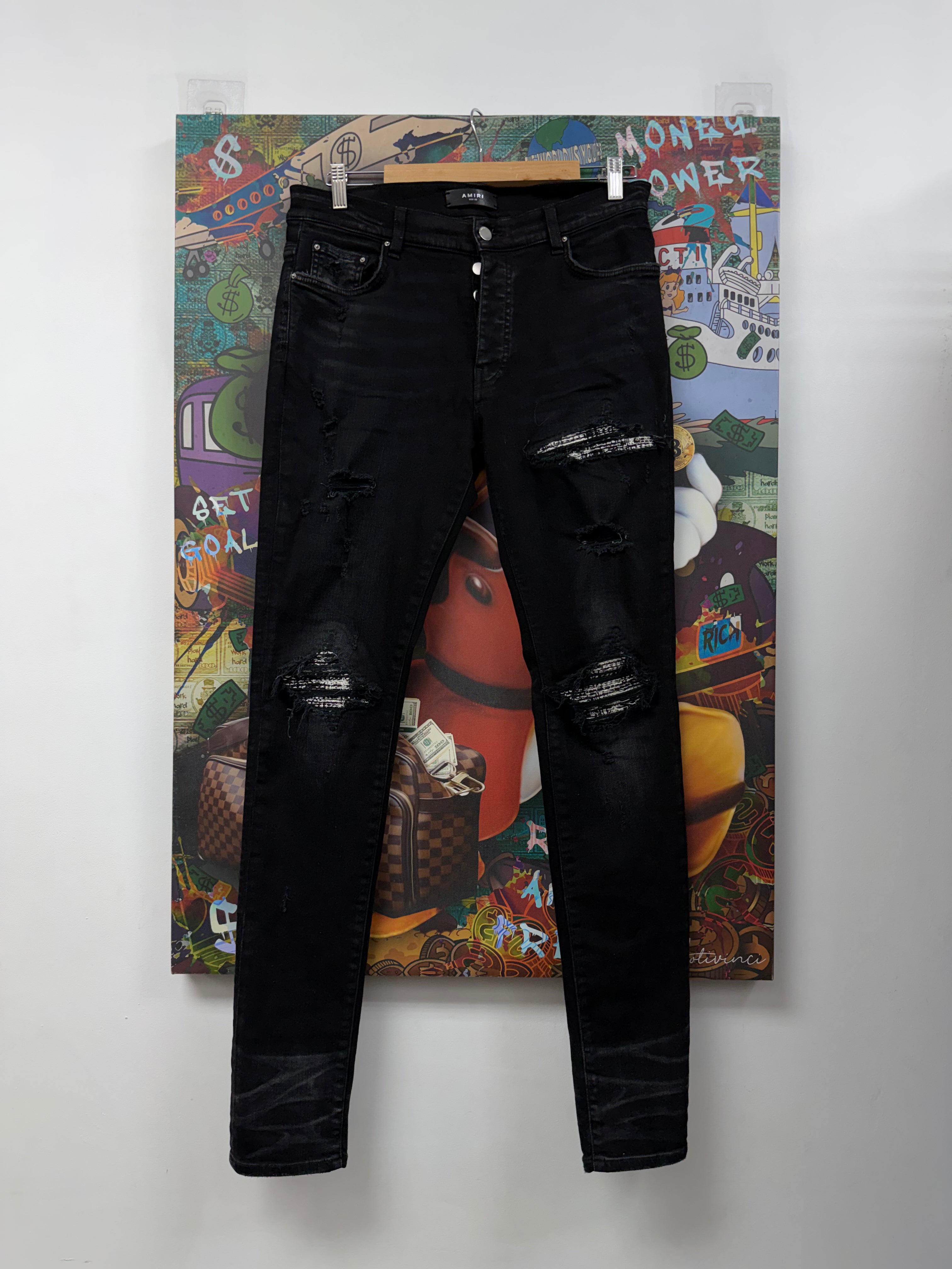 Amiri MX1 Black Wash Boucle Patch Jeans