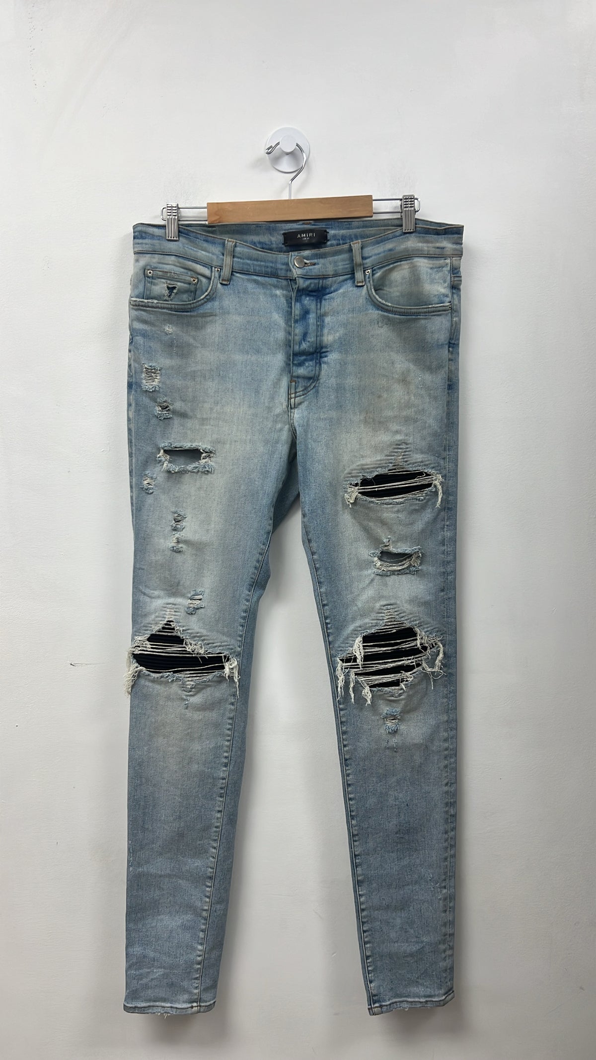 Amiri MX1 Light Wash Black Suede Patch Jeans