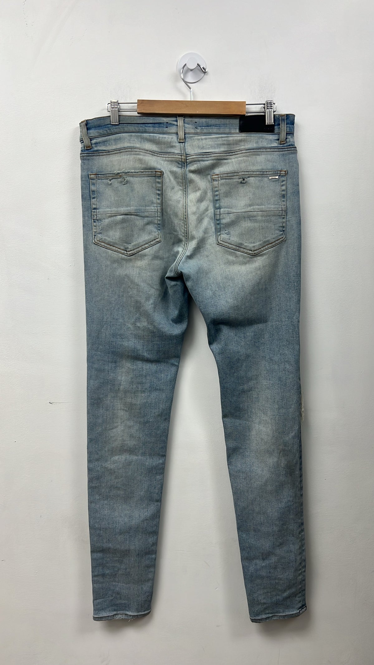 Amiri MX1 Light Wash Black Suede Patch Jeans