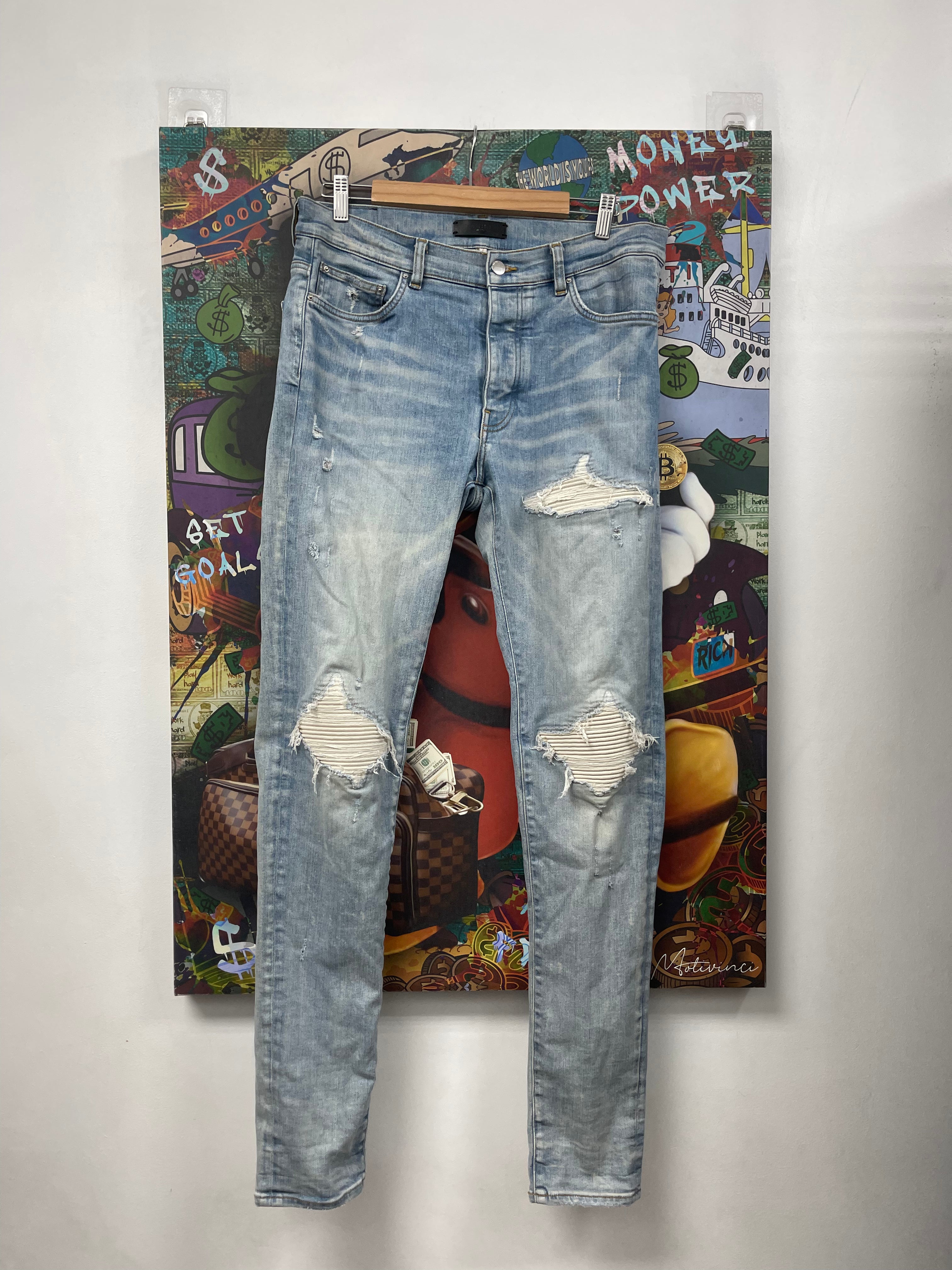 Amiri MX1 Light Wash White Suede Patch Jeans
