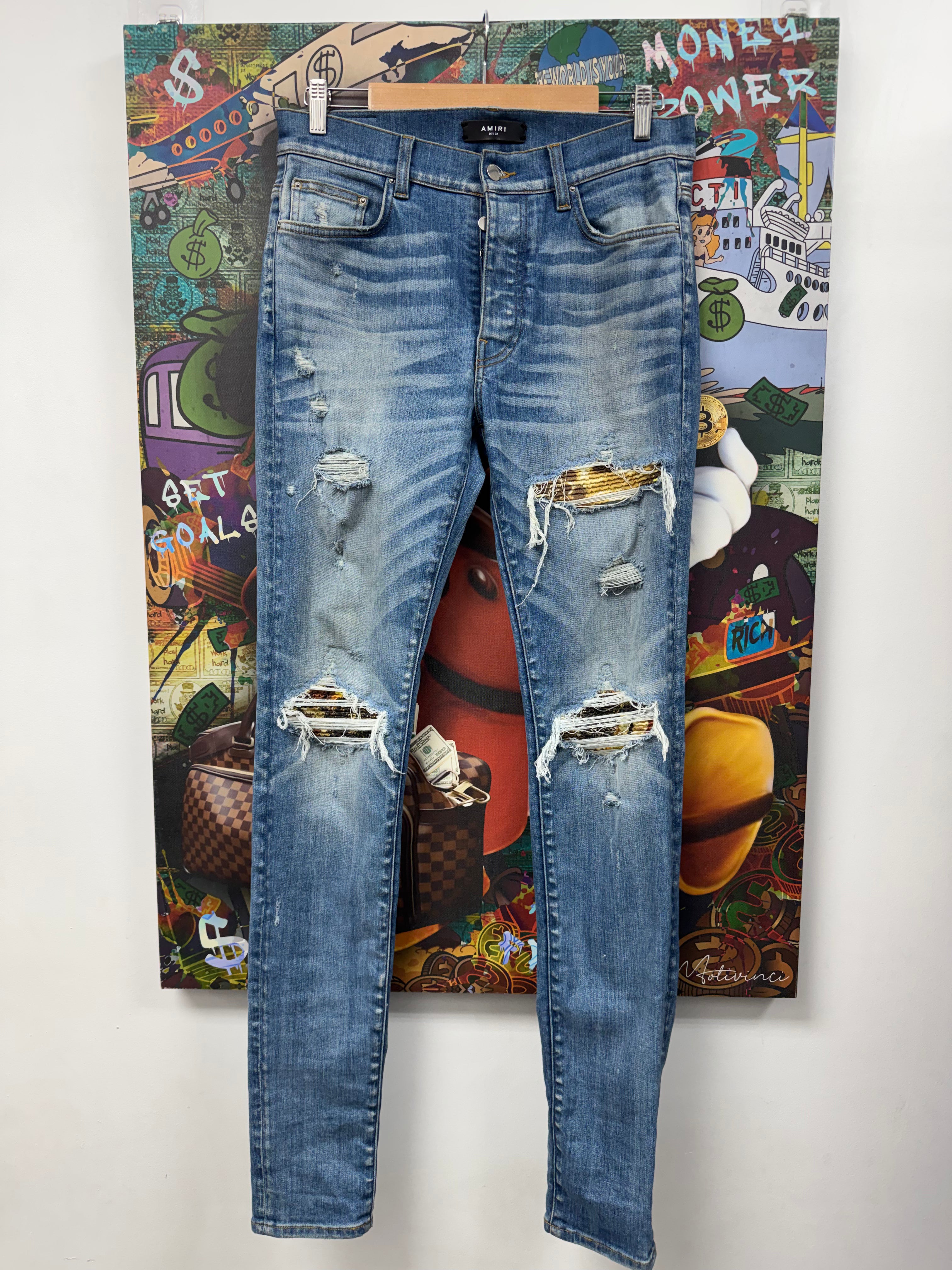 Amiri MX1 Light Wash Aloha Patch Jeans