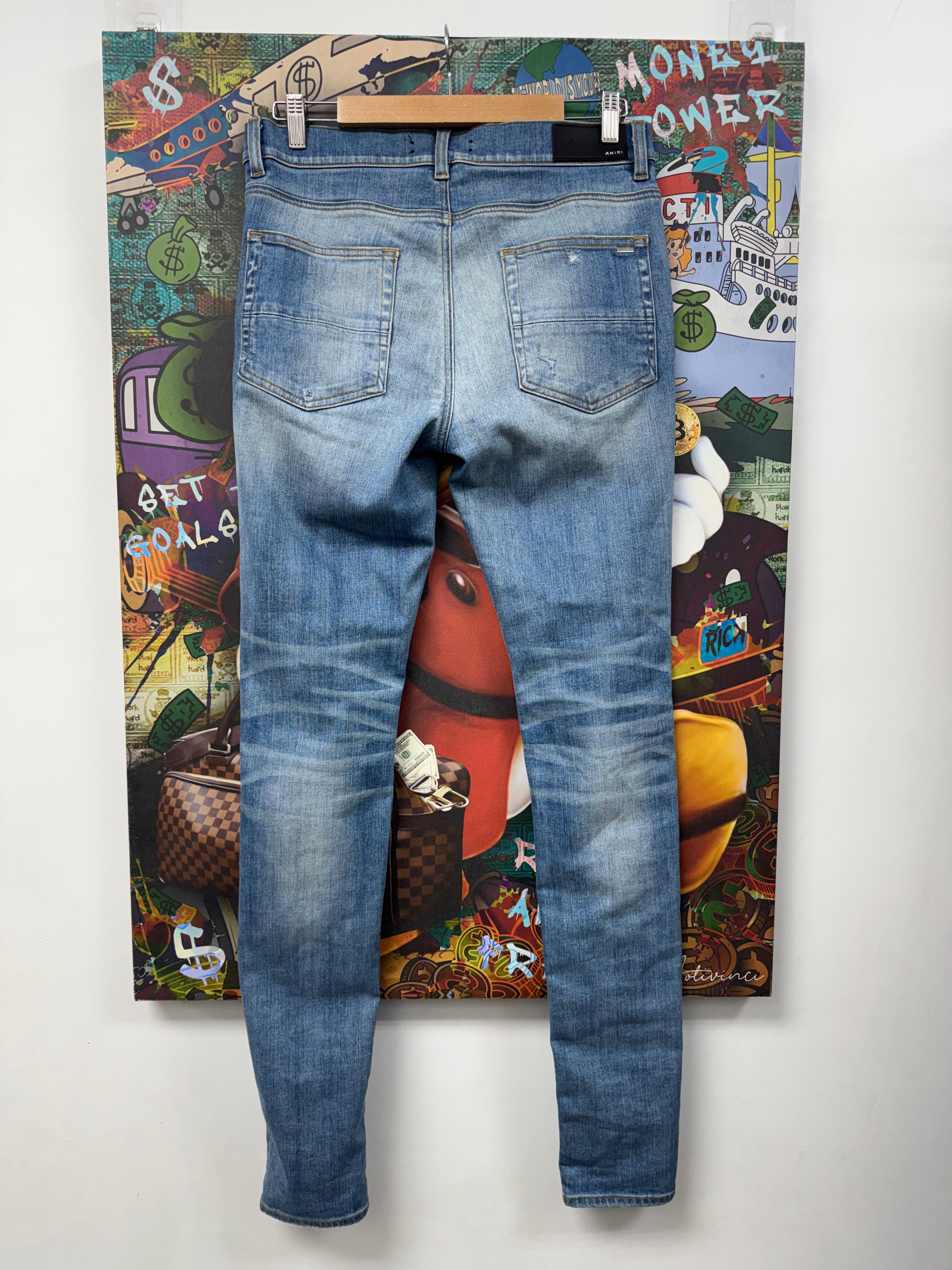 Amiri MX1 Light Wash Aloha Patch Jeans