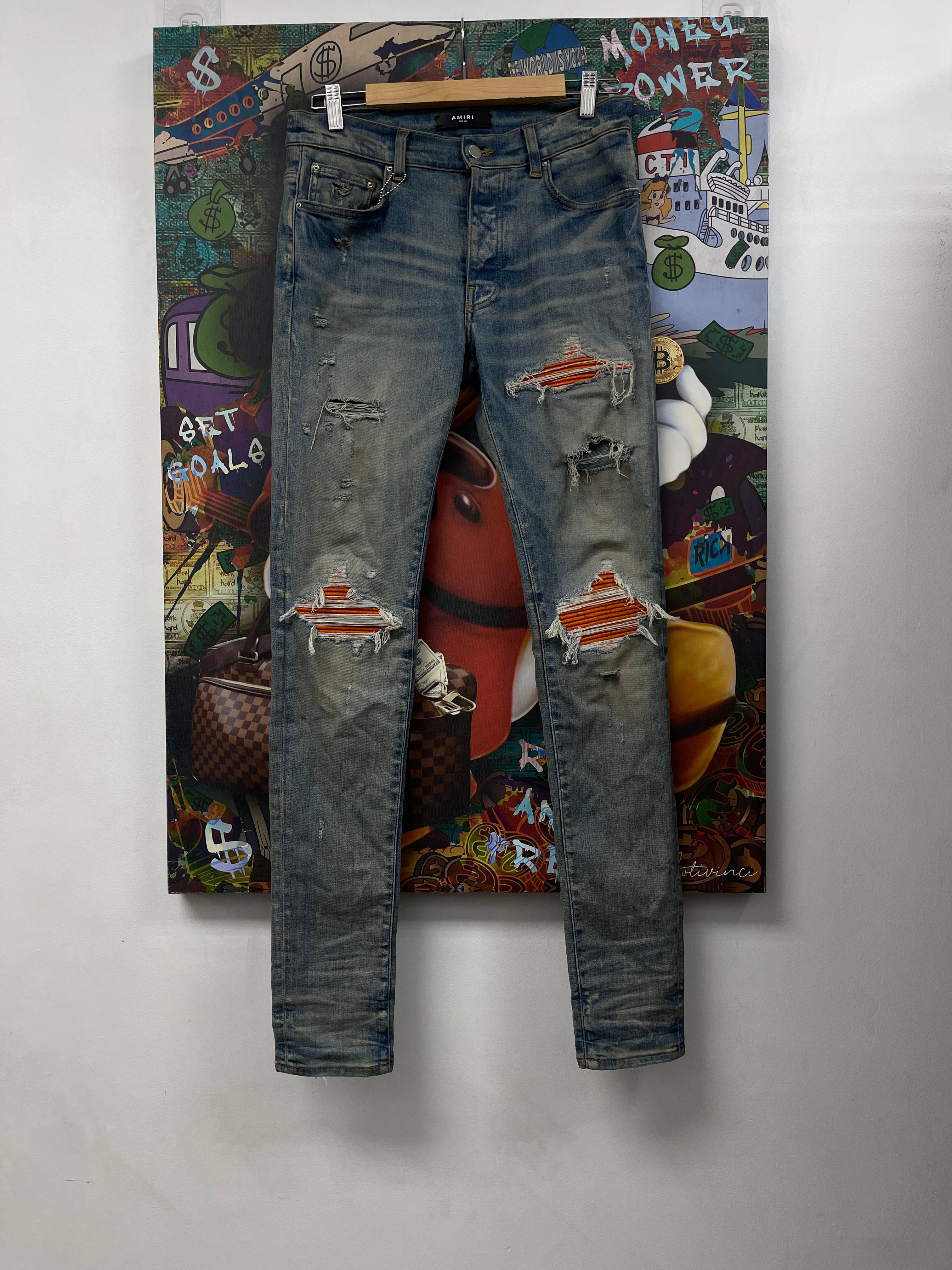 Amiri MX1 Light Wash Orange Crackle Patch Jeans