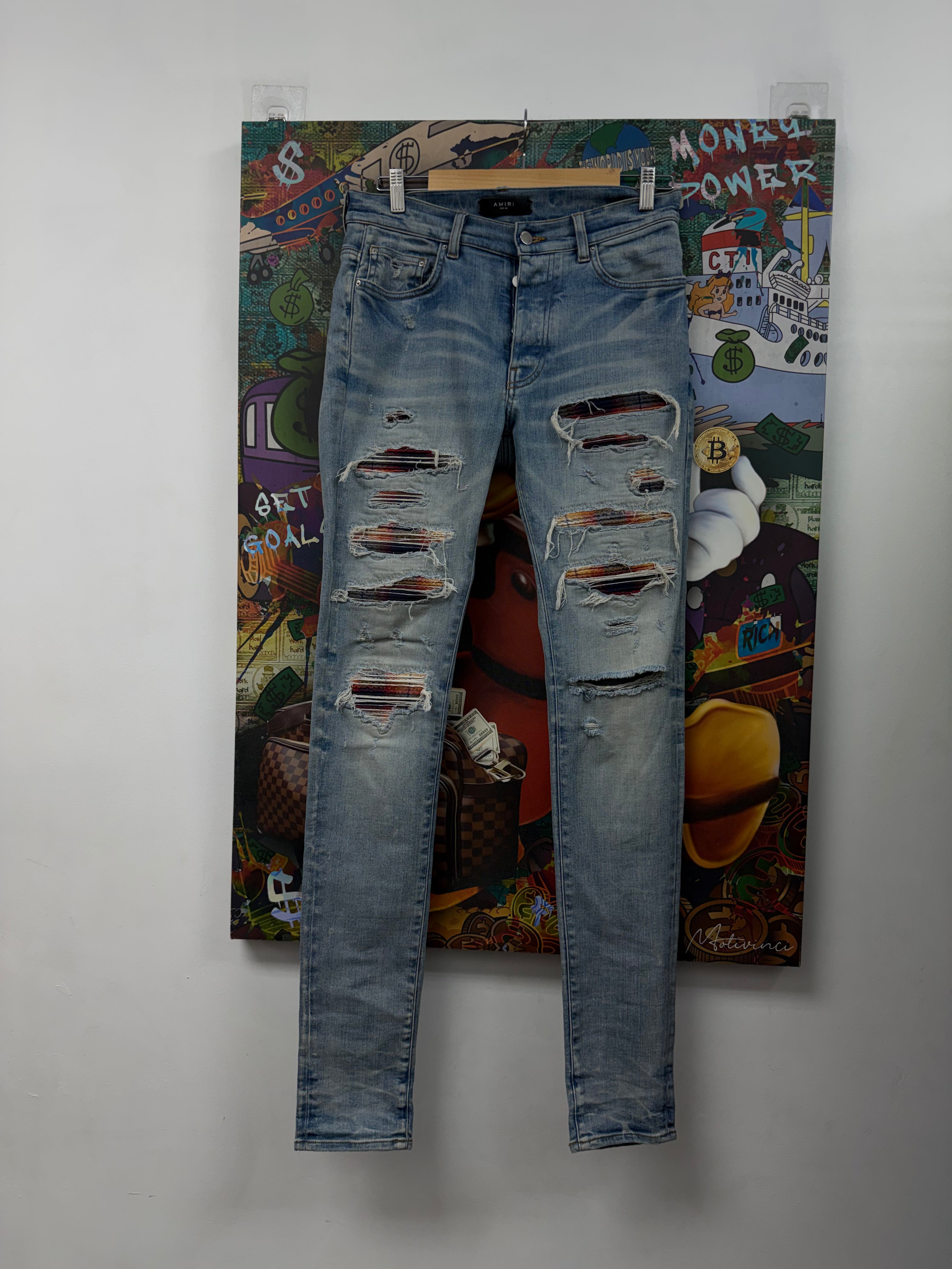 Amiri Light Wash Sunset Thrasher Patch Jeans