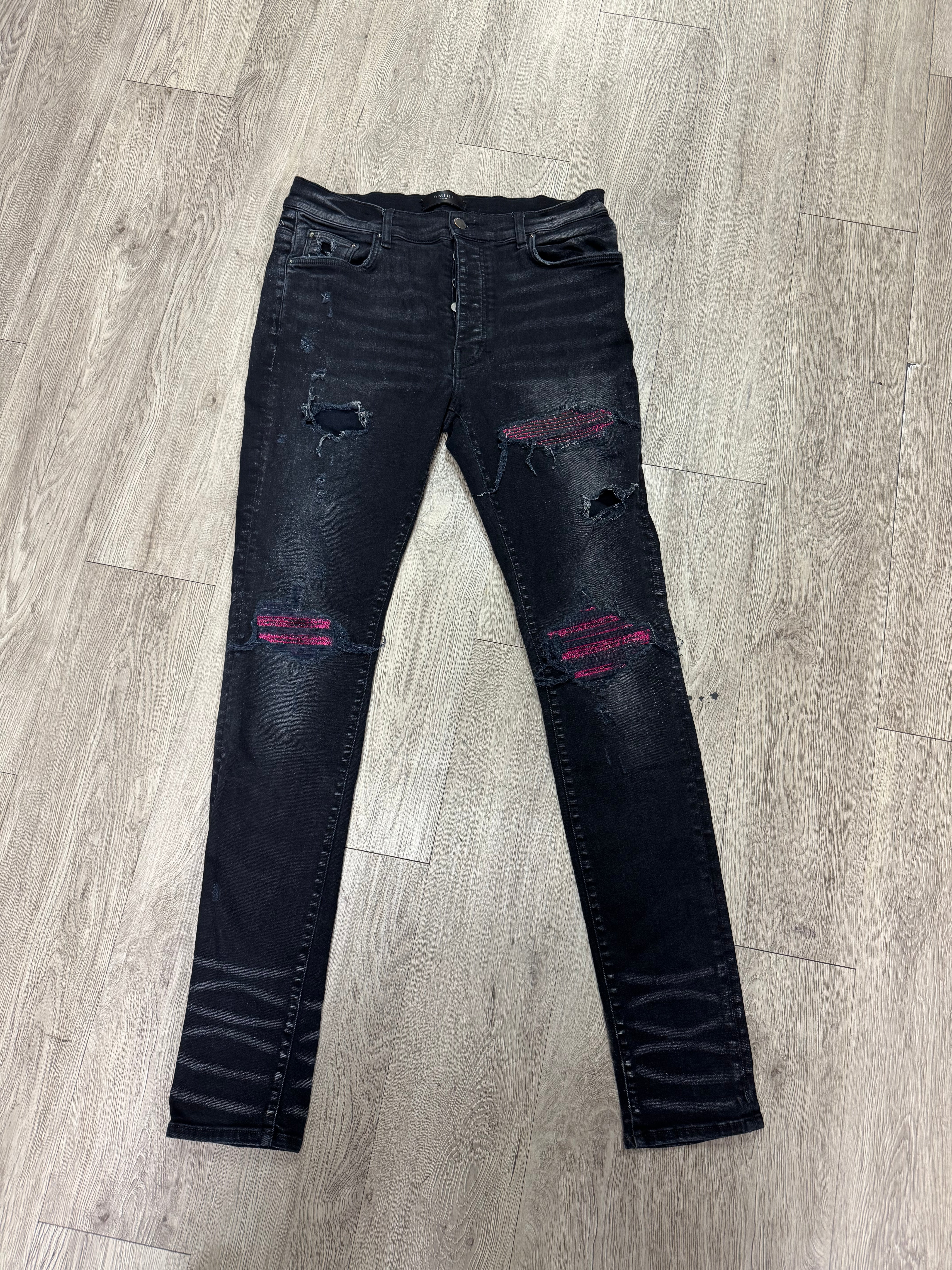 Amiri MX1 Black Wash Pink Crackle Patch Jeans