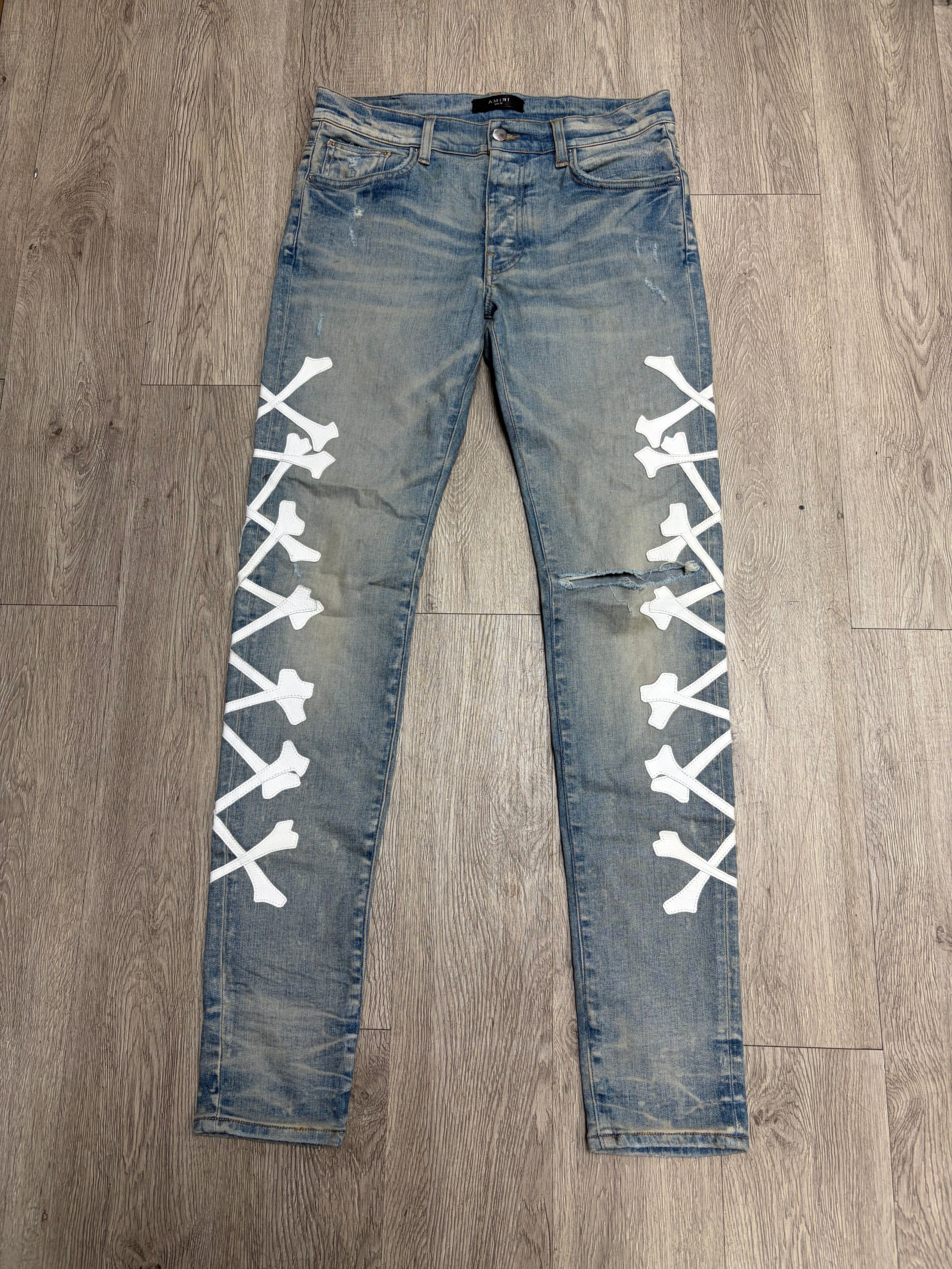 Amiri Light Wash White Bones Jeans