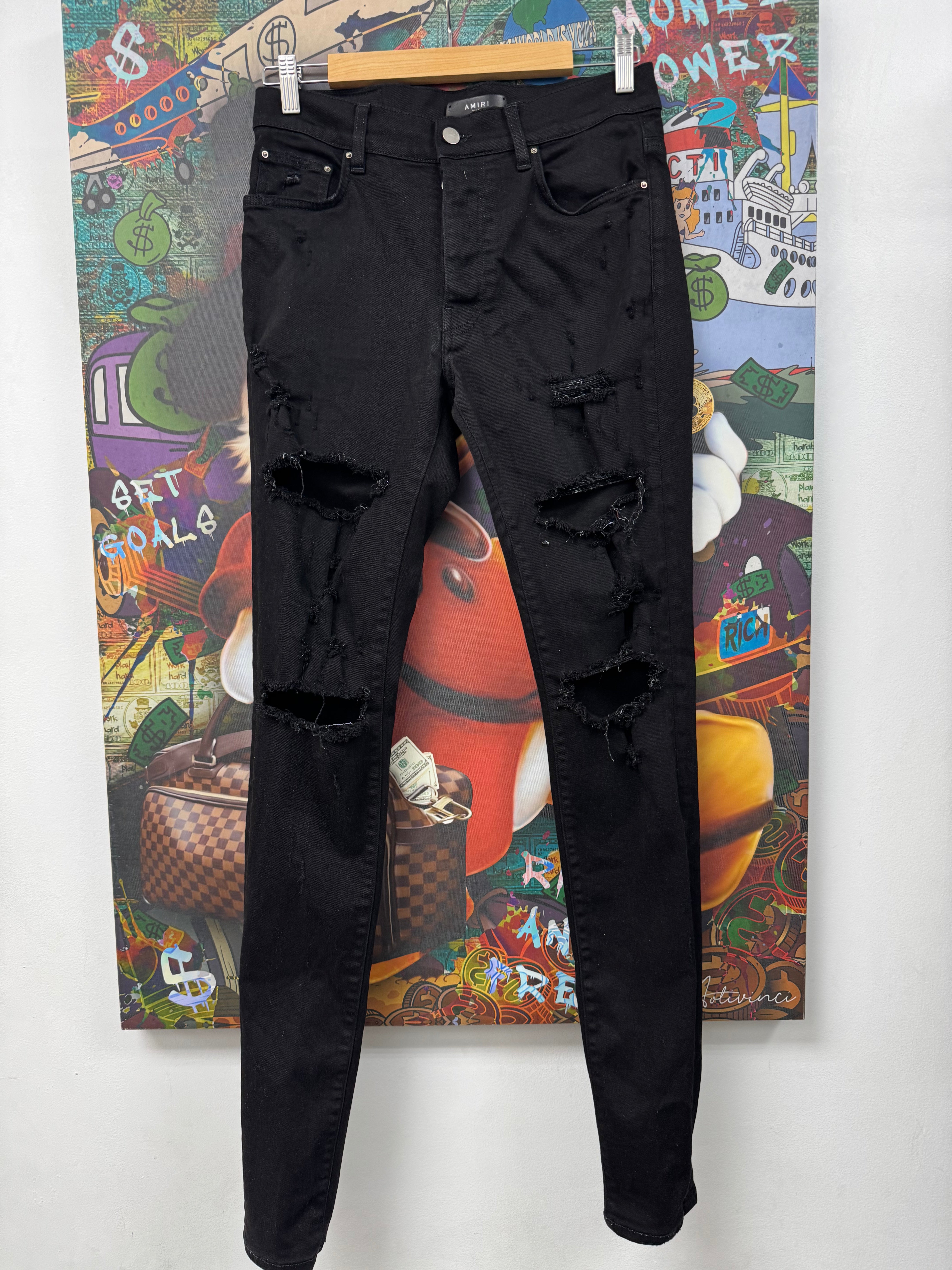Amiri Black Ripped Thrasher Jeans
