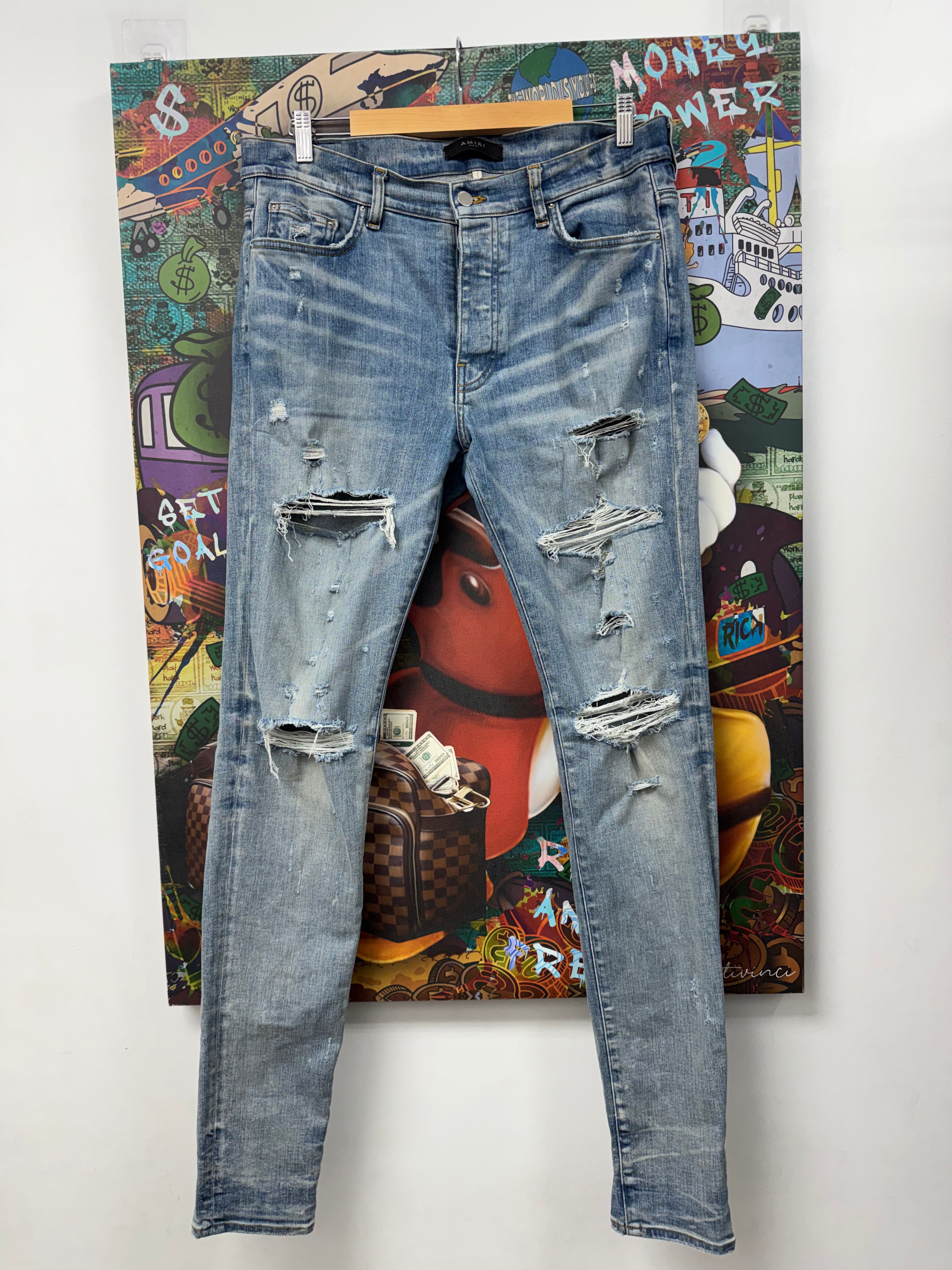 Amiri Light Wash Plain Ripped Jeans