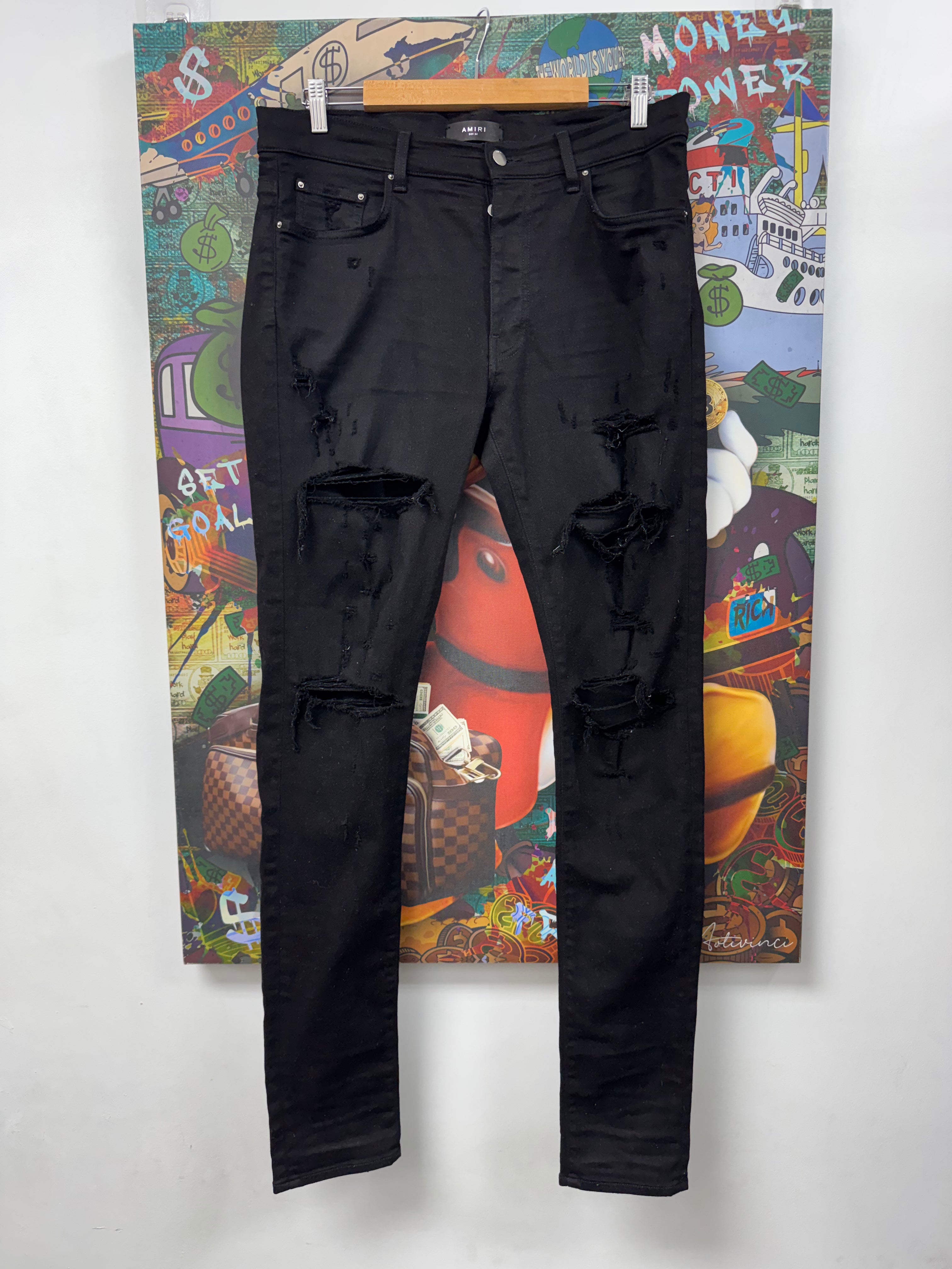 Amiri Black Ripped Thrasher Jeans