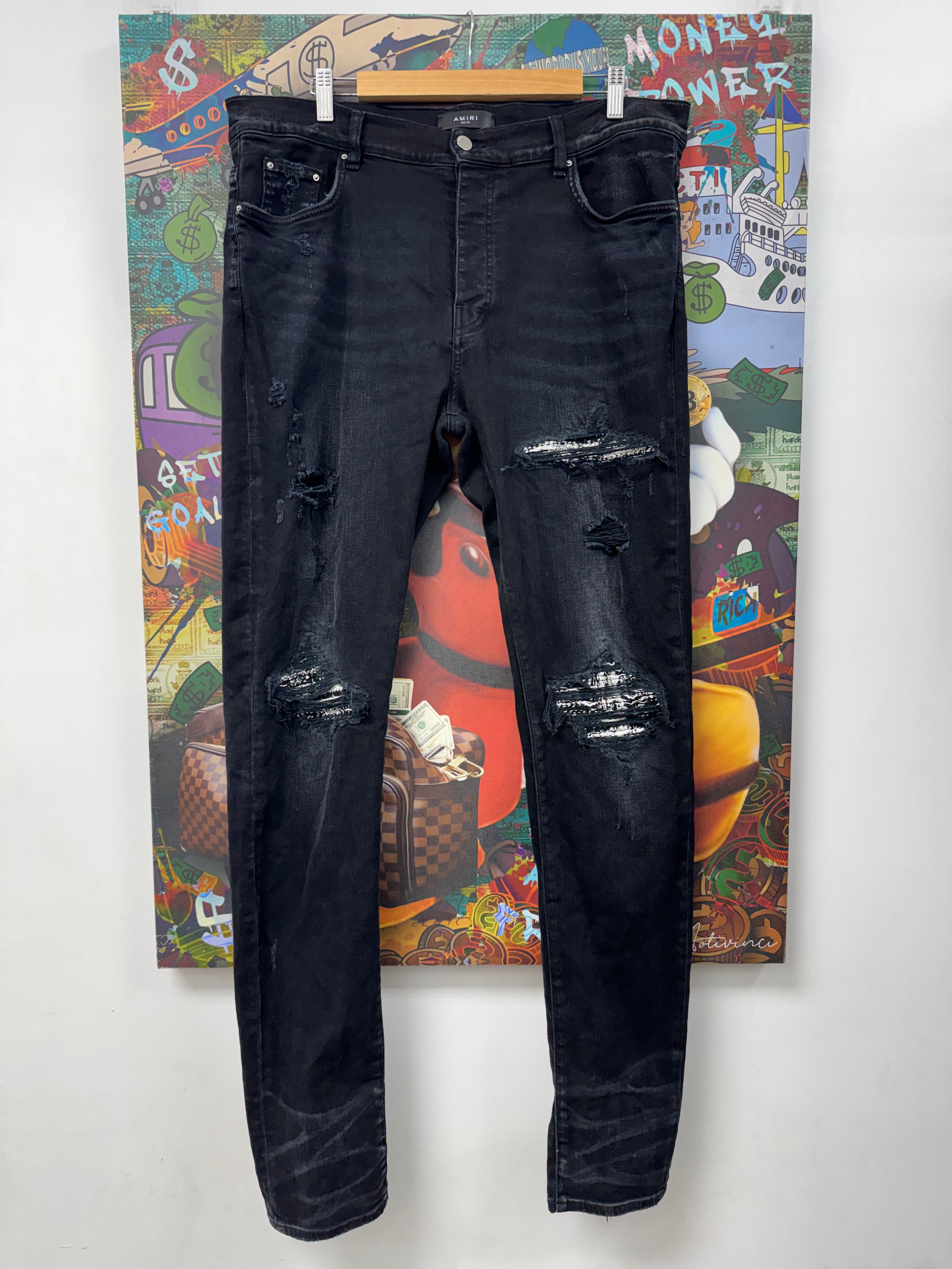 Amiri MX1 Black Wash Boucle Patch Jeans