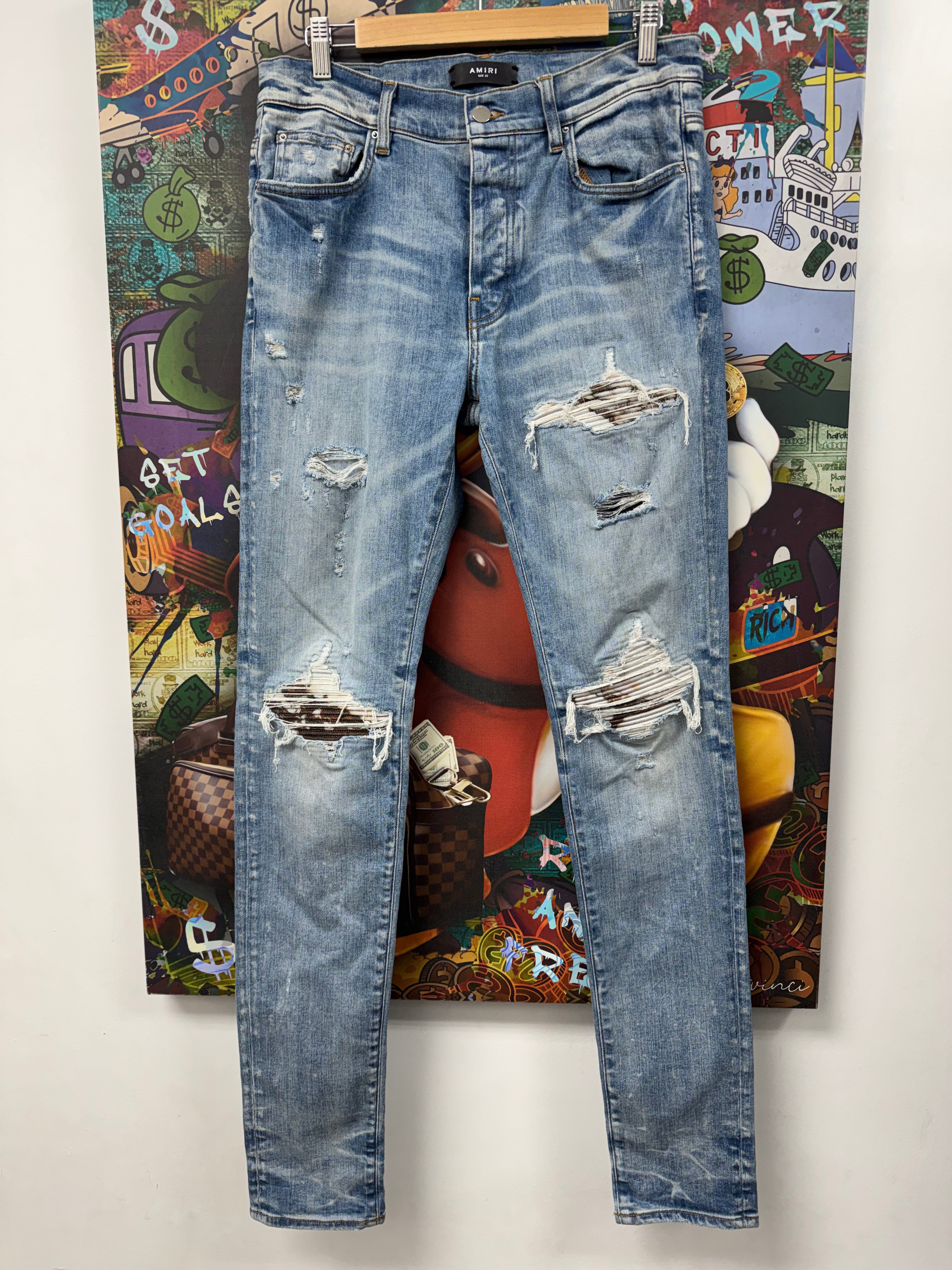Amiri MX1 Light Wash Marble Patch Jeans