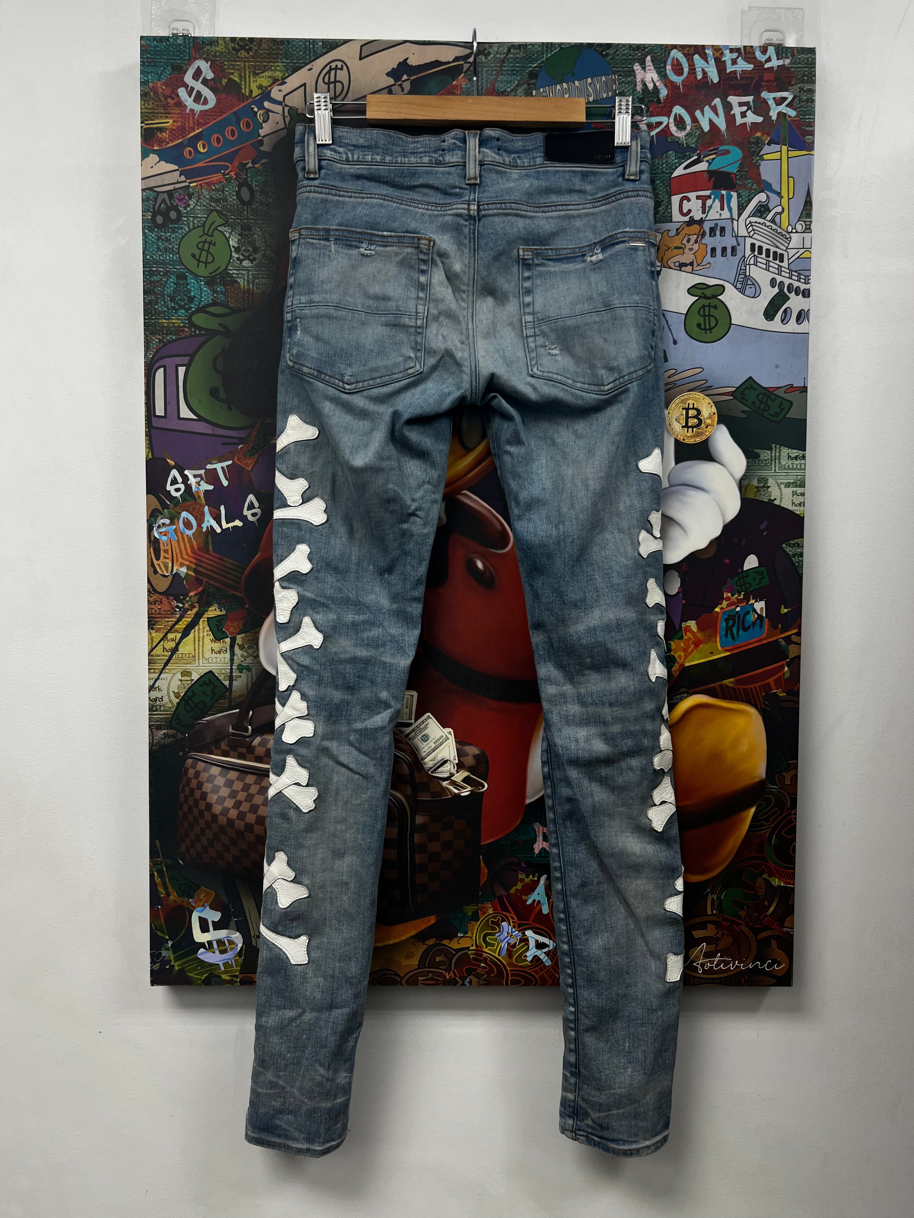 Amiri Light Wash White Bones Jeans