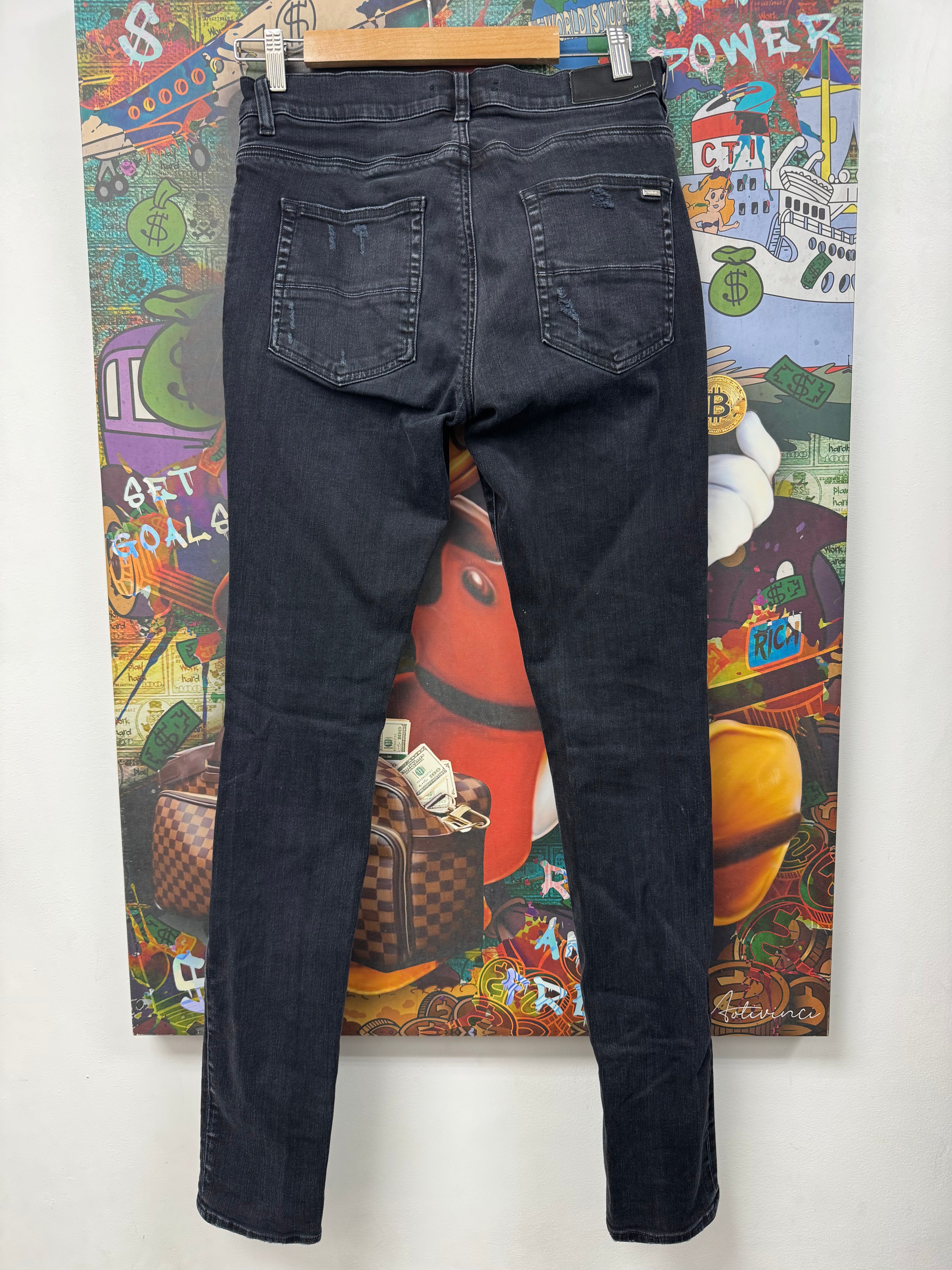 Amiri Black Wash Knee Ripped Jeans