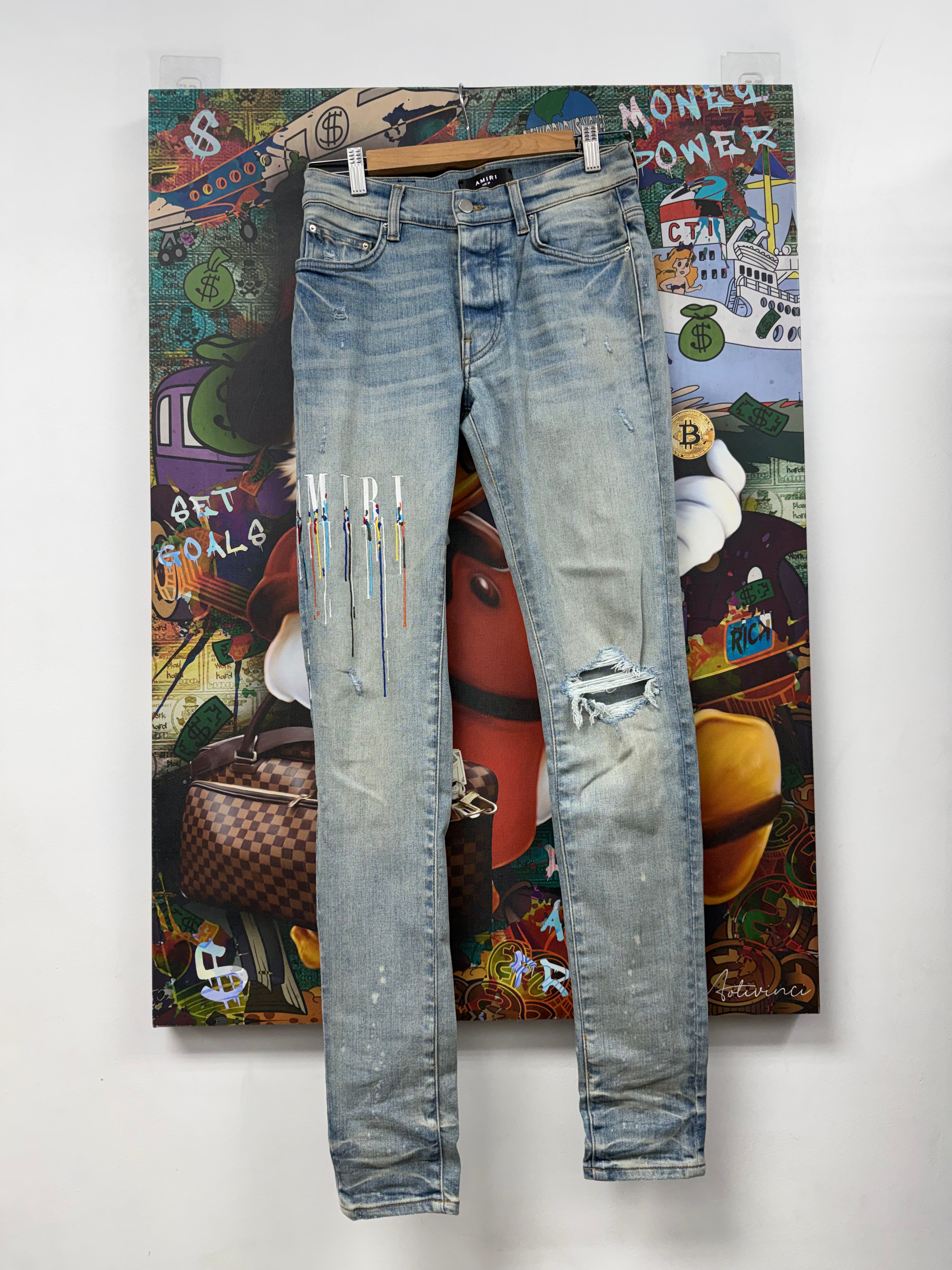 Amiri Light Wash Paint Drip Jeans