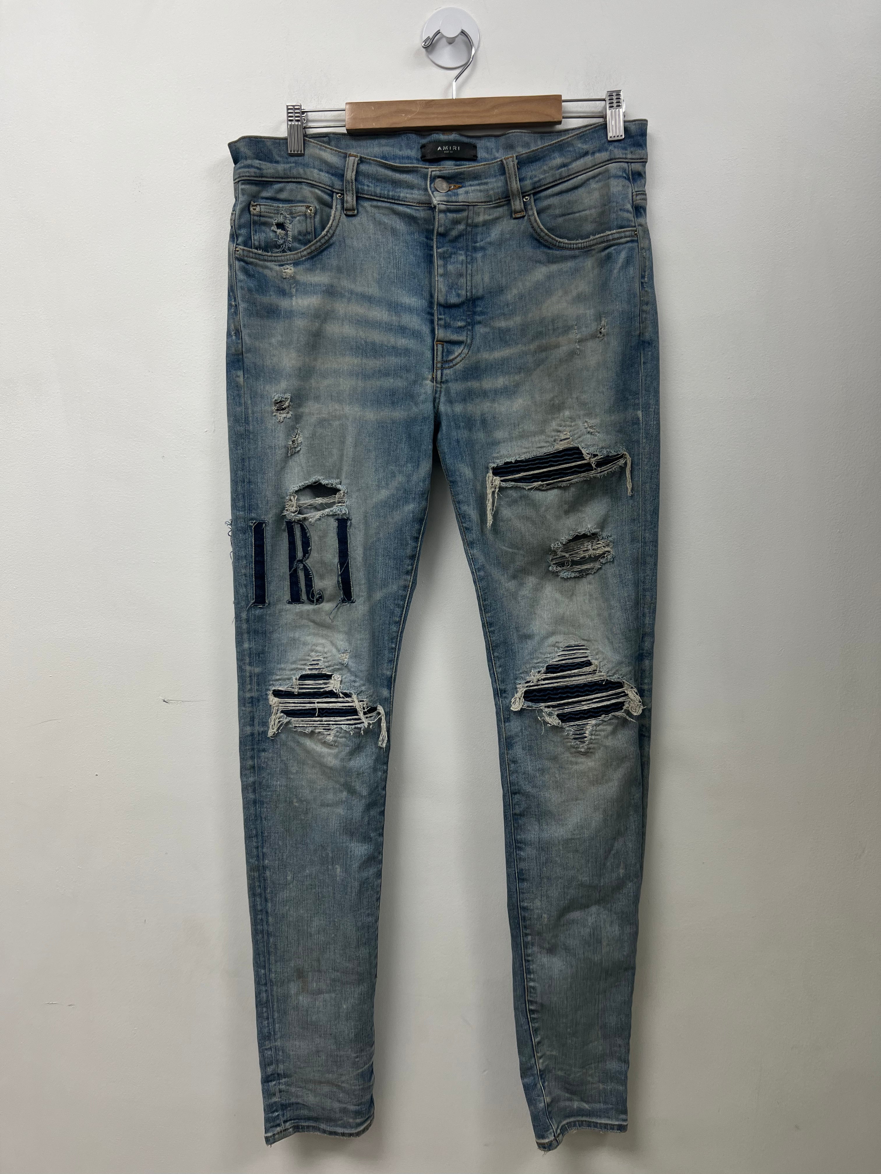 Amiri Light Wash Denim Side Logo Jeans