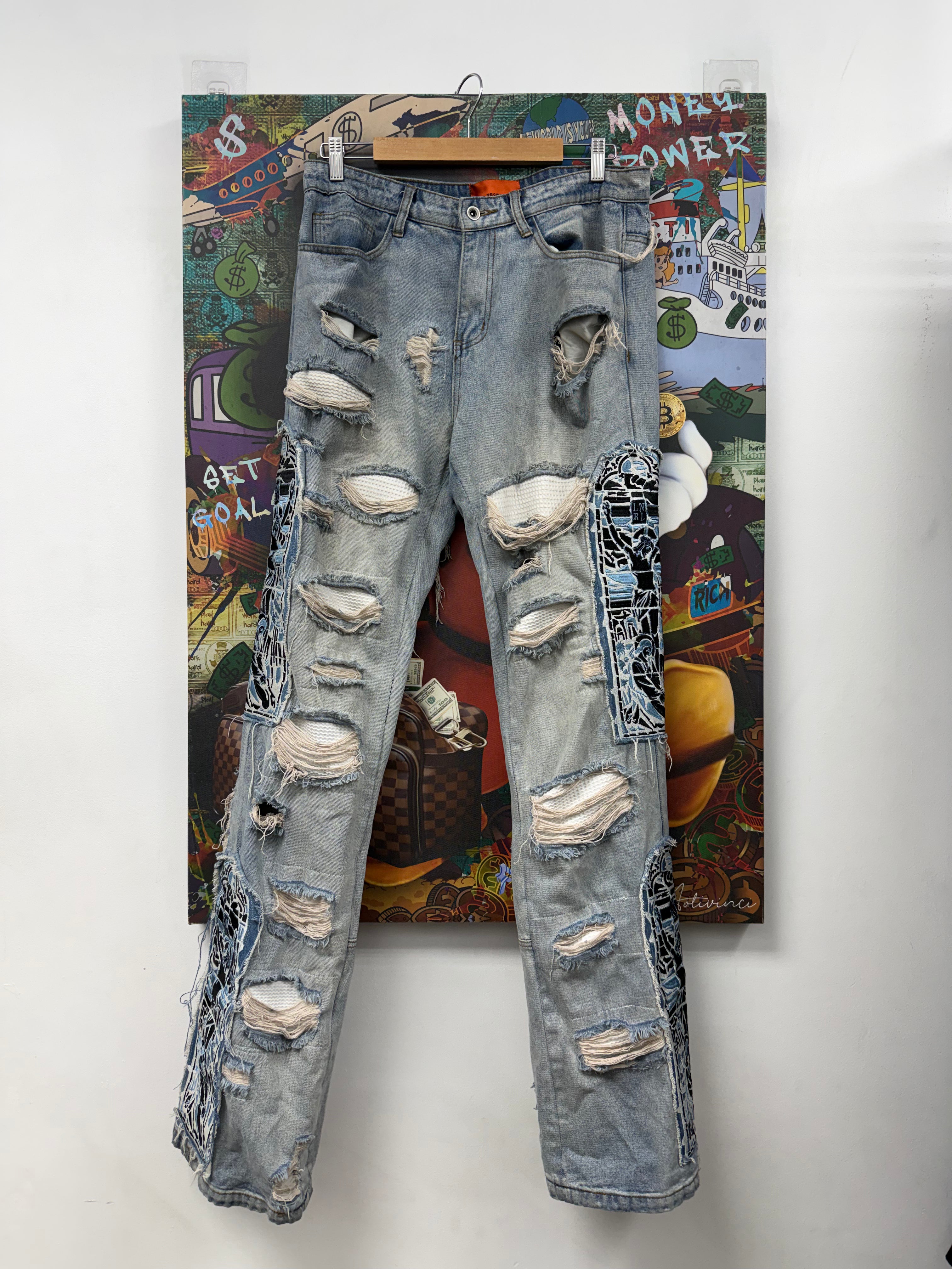 Who Decides War Light Wash Blue Black Distressed Jesus Jeans