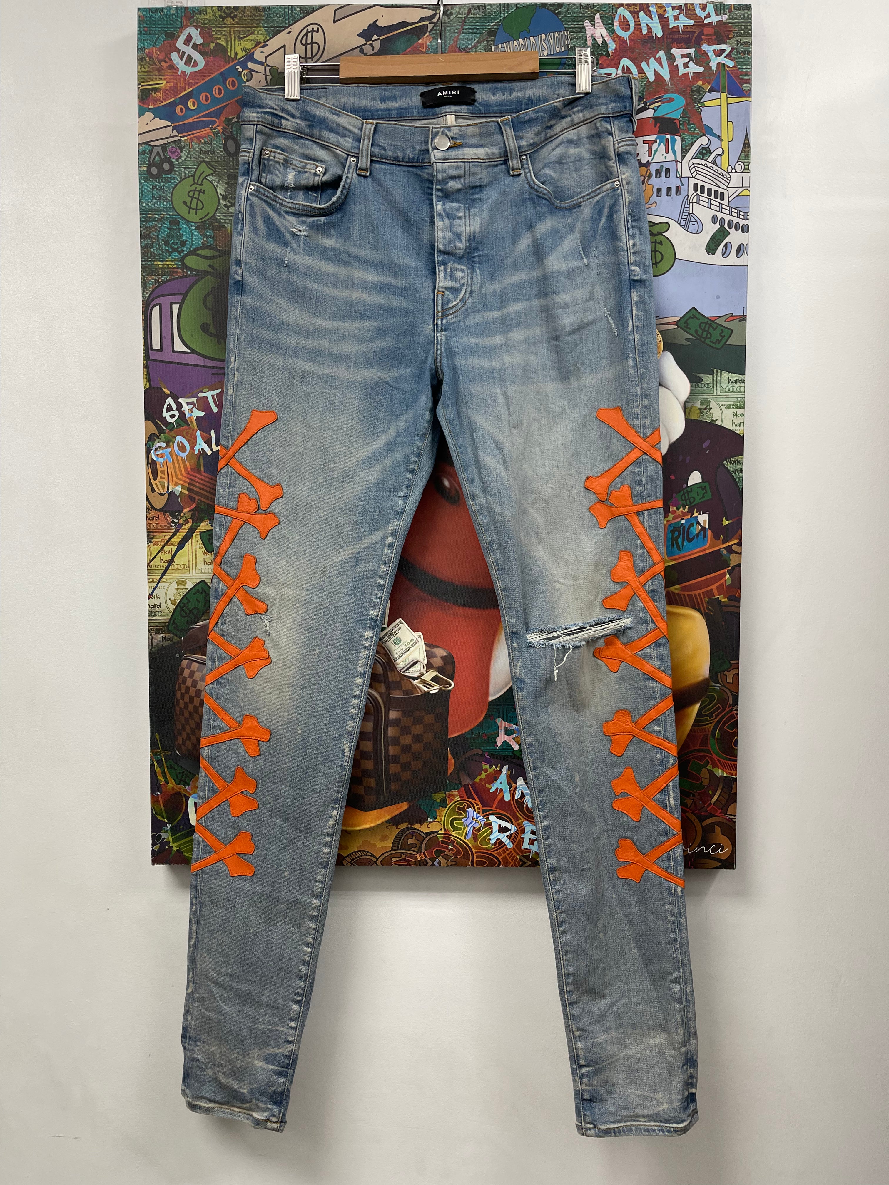 Amiri Light Wash Orange Bones Jeans
