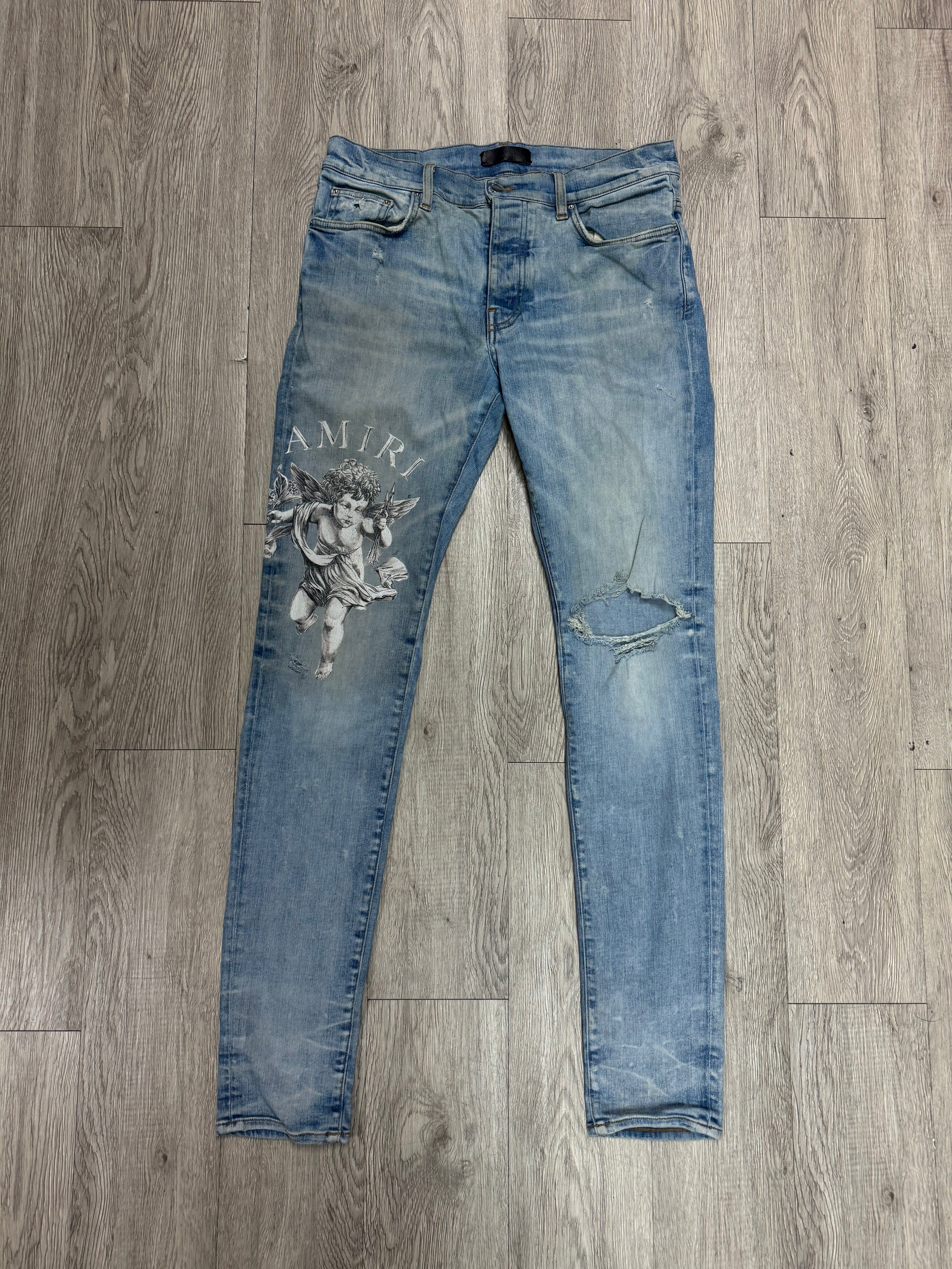 Amiri Light Wash Cherub Jeans