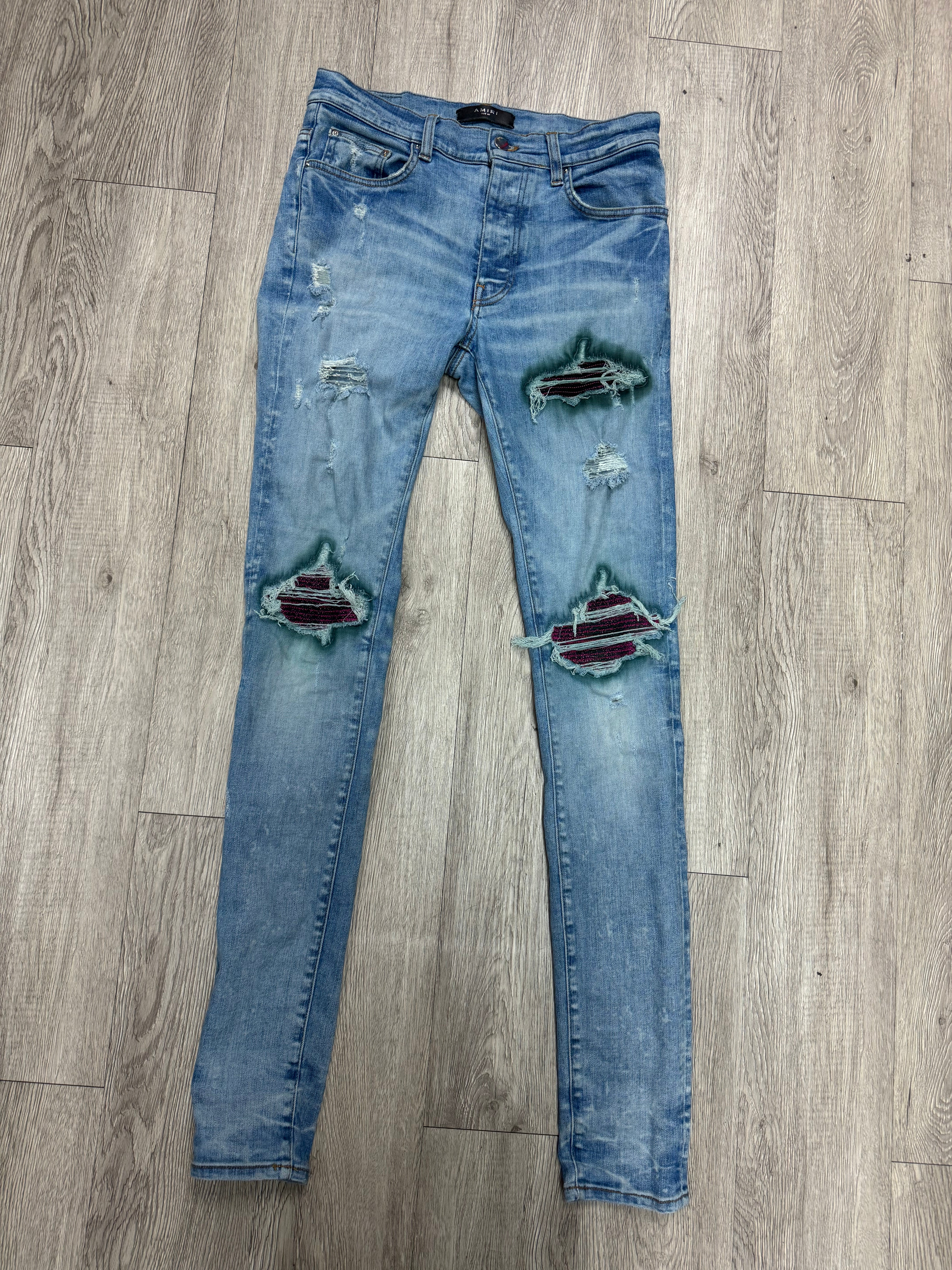 Amiri MX1 Light Wash Pink Crackle Patch Jeans