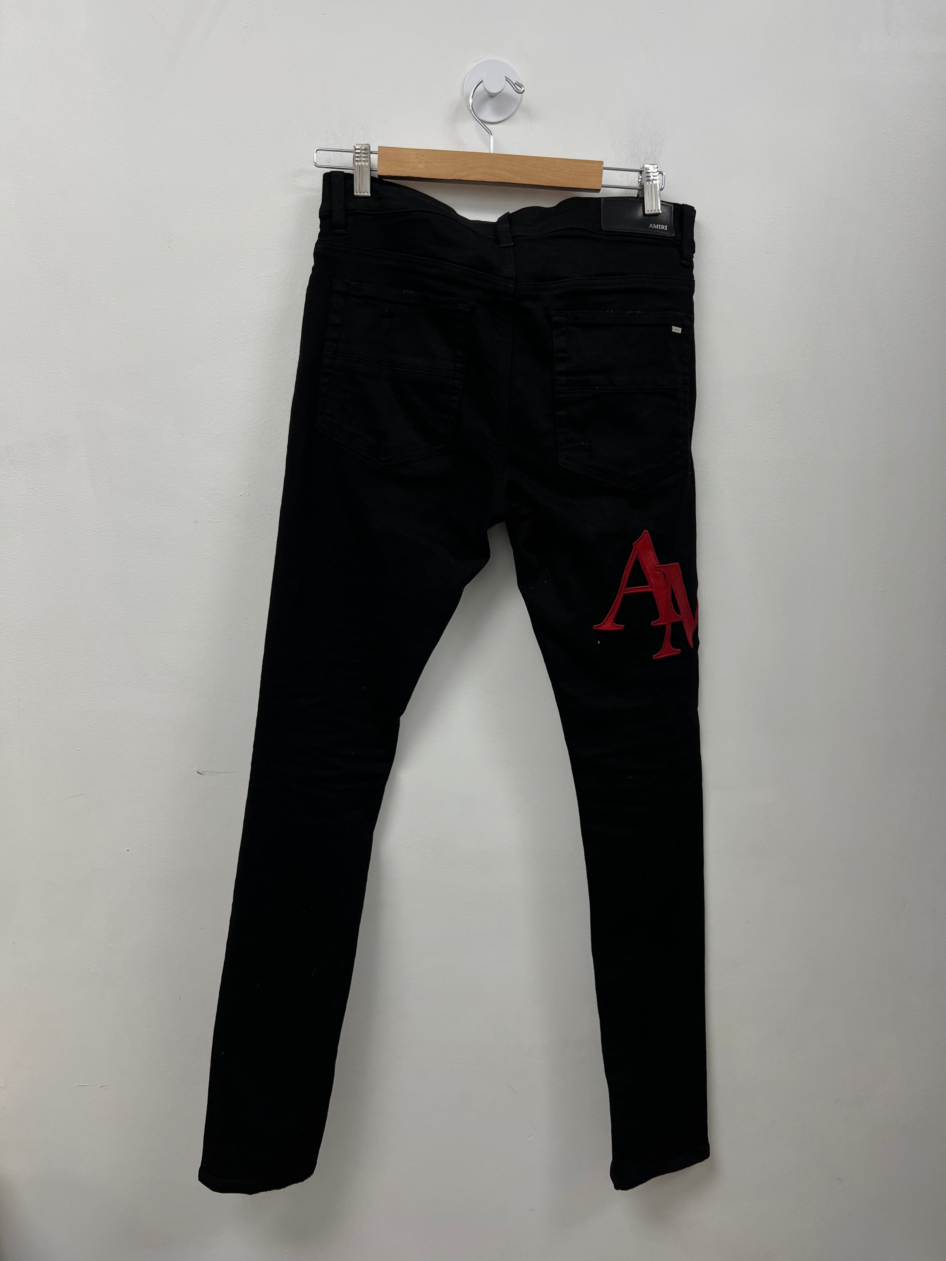 Amiri Black Red Staggered Logo Jeans