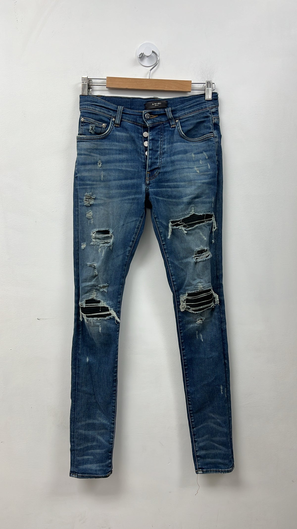 Amiri MX1 Light Wash Black Suede Patch Jeans