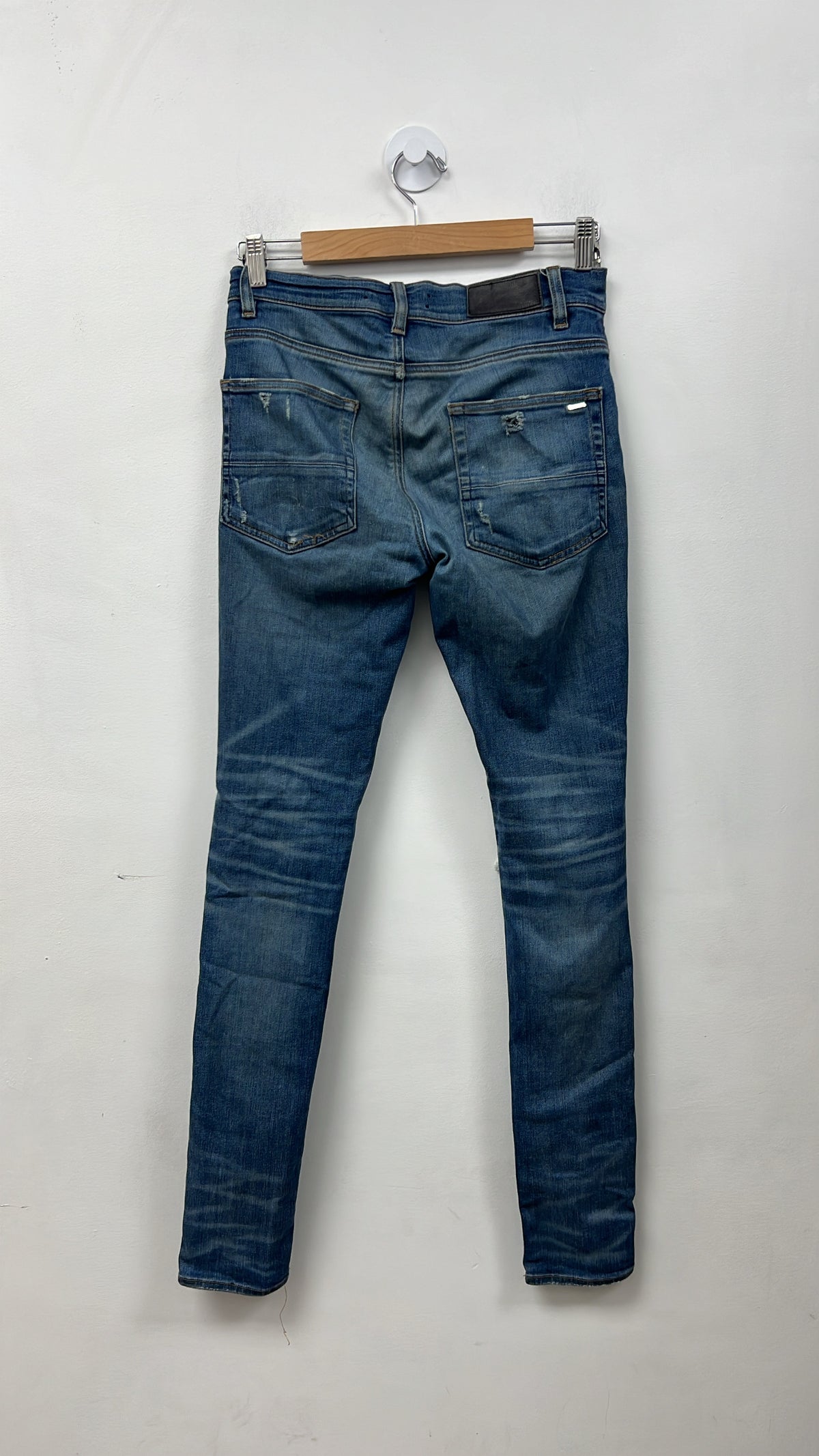 Amiri MX1 Light Wash Black Suede Patch Jeans