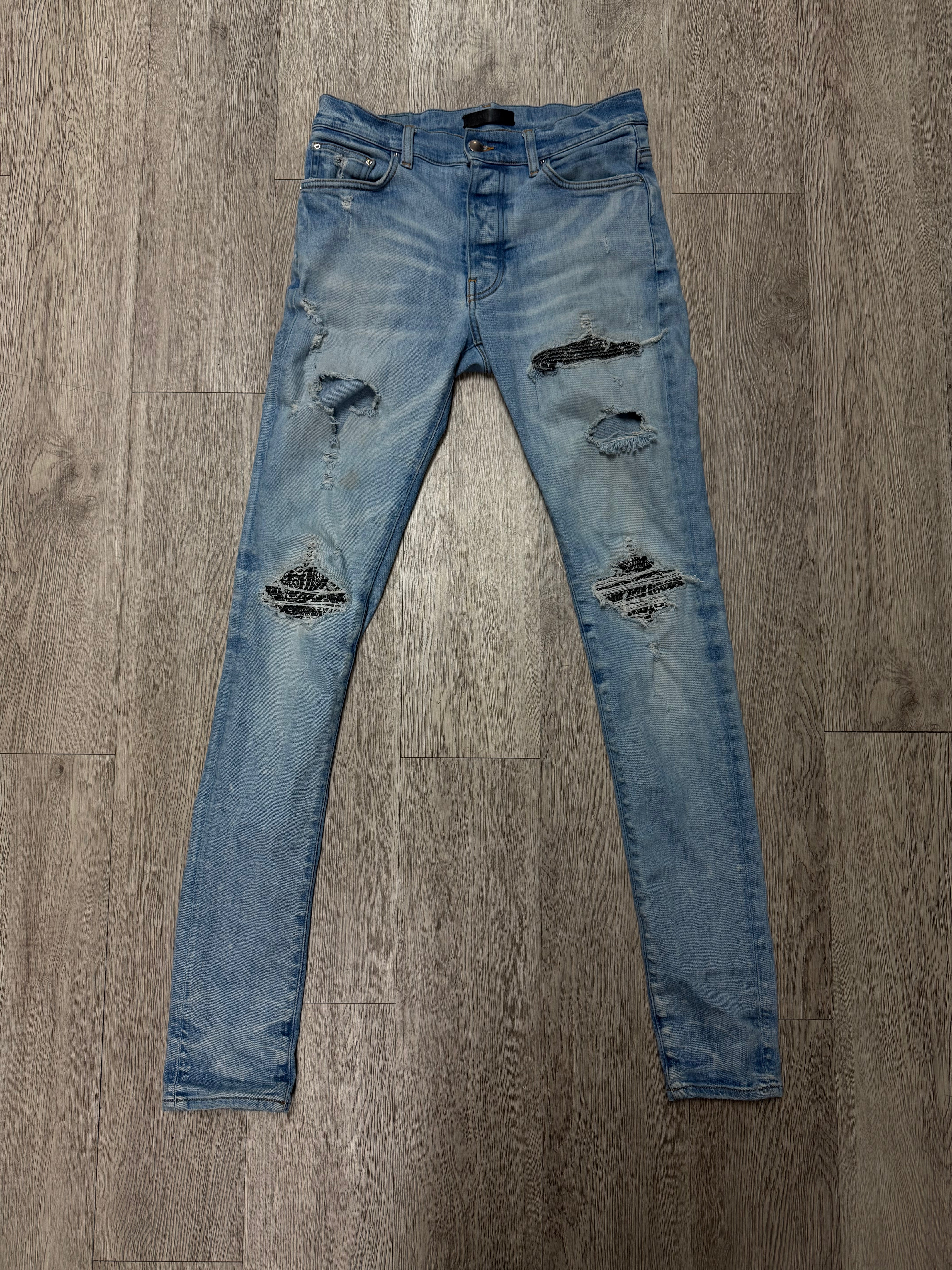 Amiri Light Wash Black Paisley Patch MX1 Jeans