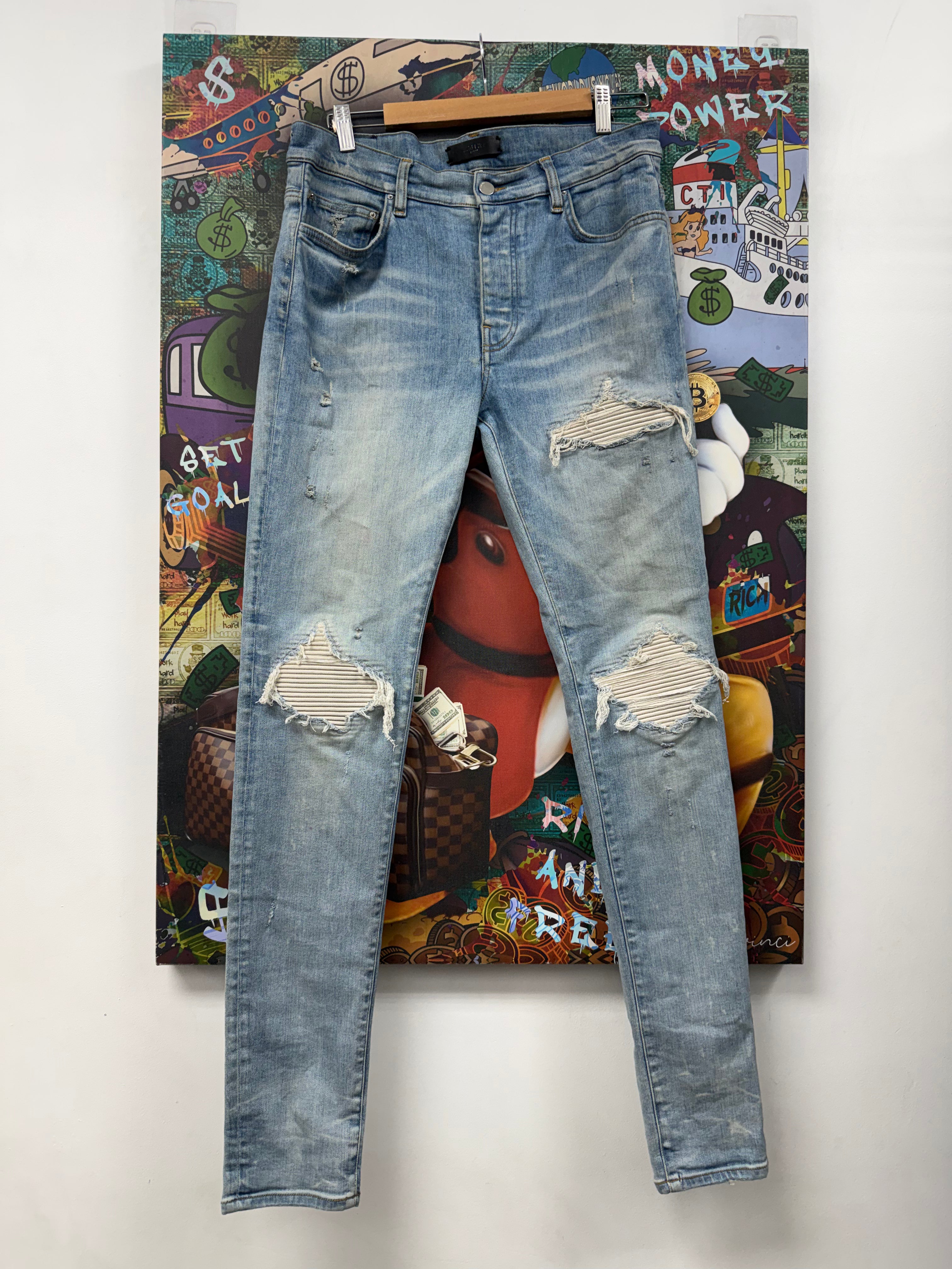 Amiri MX1 Light Wash White Ultra Suede Patch Jeans