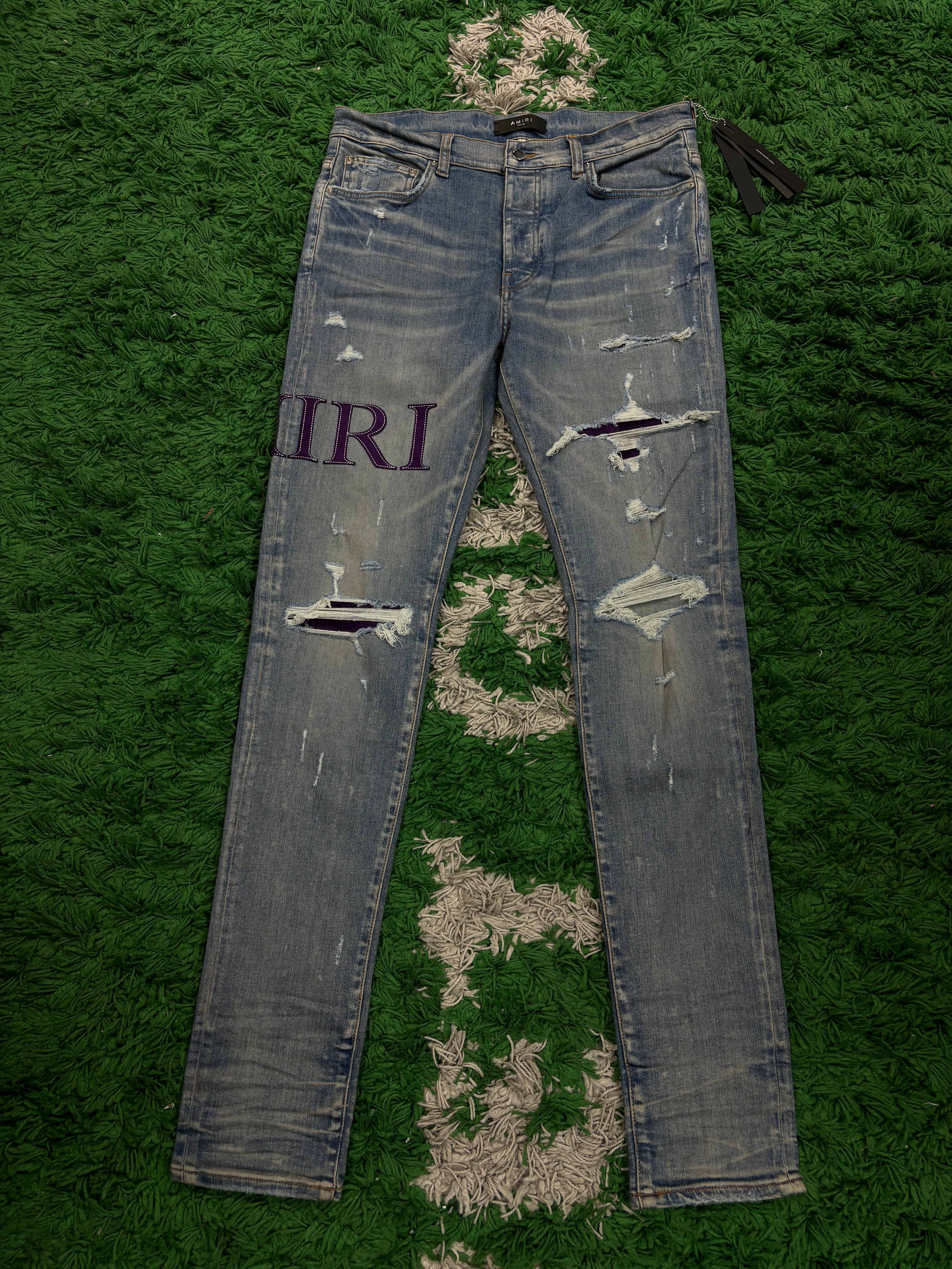Amiri "Purple Serif" Side Logo Light Wash Blue Jeans