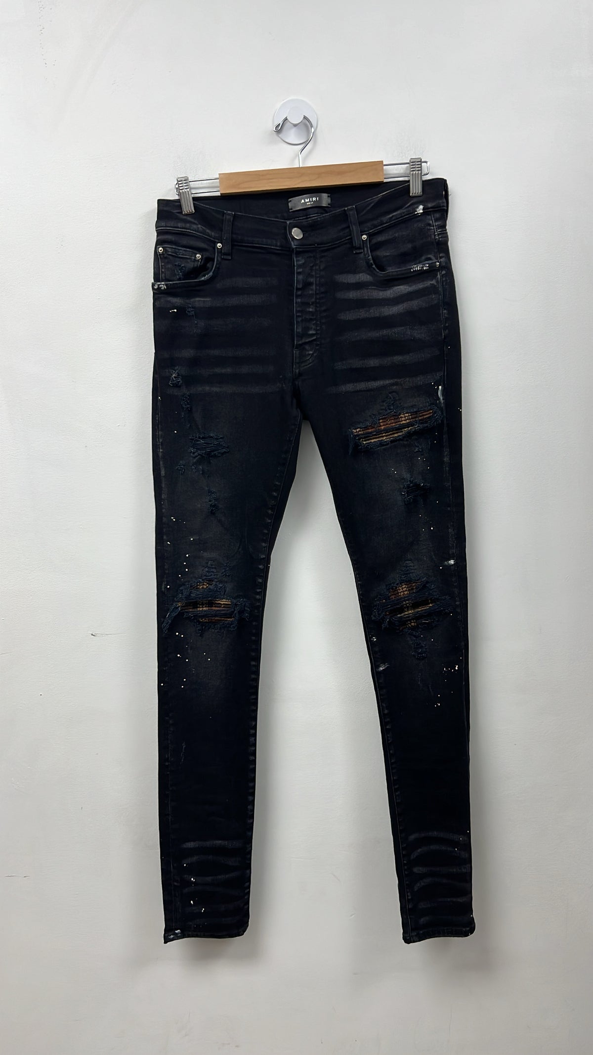 Amiri MX1 Black Wash Brown Plaid Patch Jeans