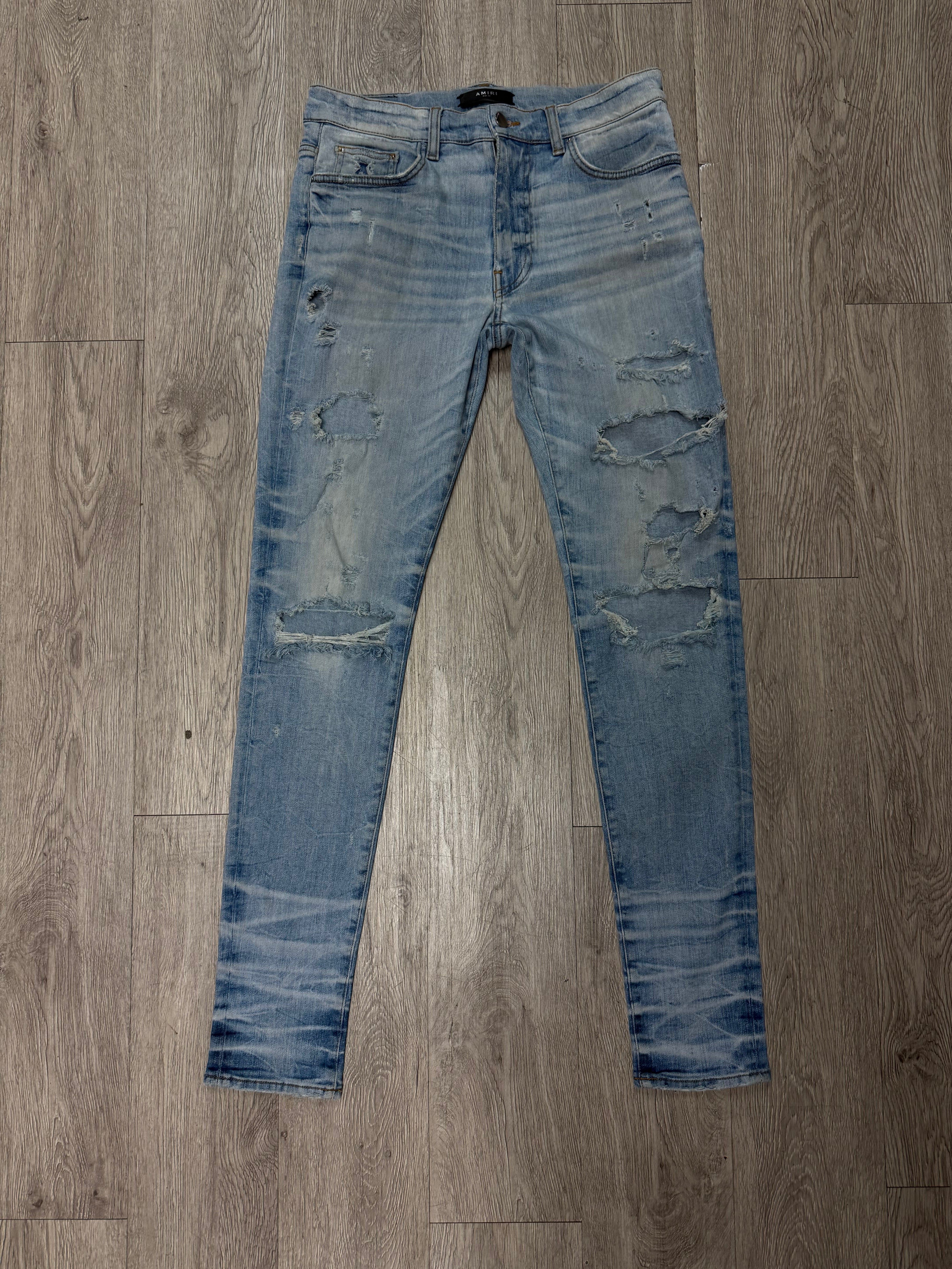 Amiri Light Wash Plain Thrasher Ripped Jeans