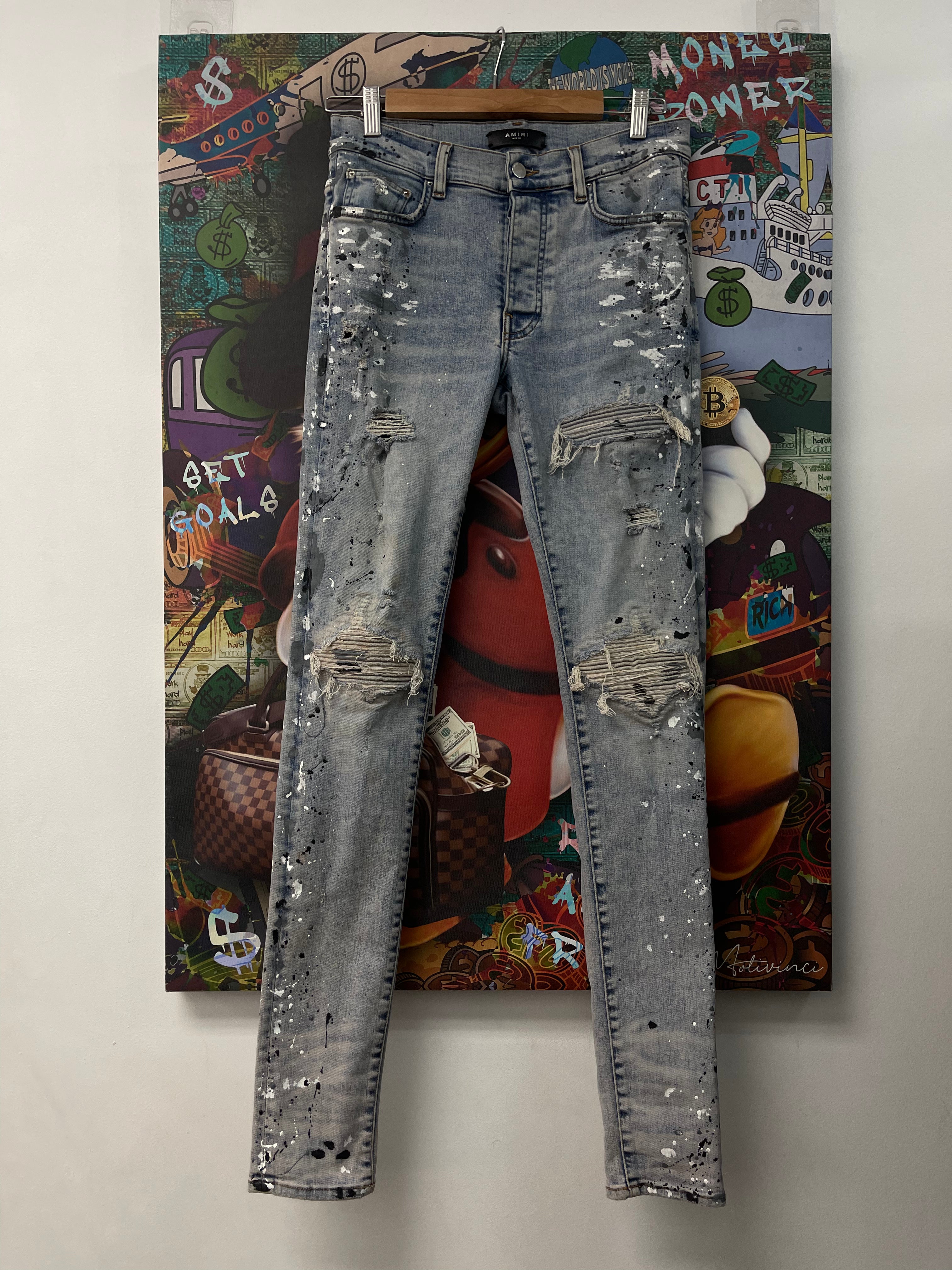 Amiri Light Wash Denim Splatter Patch MX1 Jeans