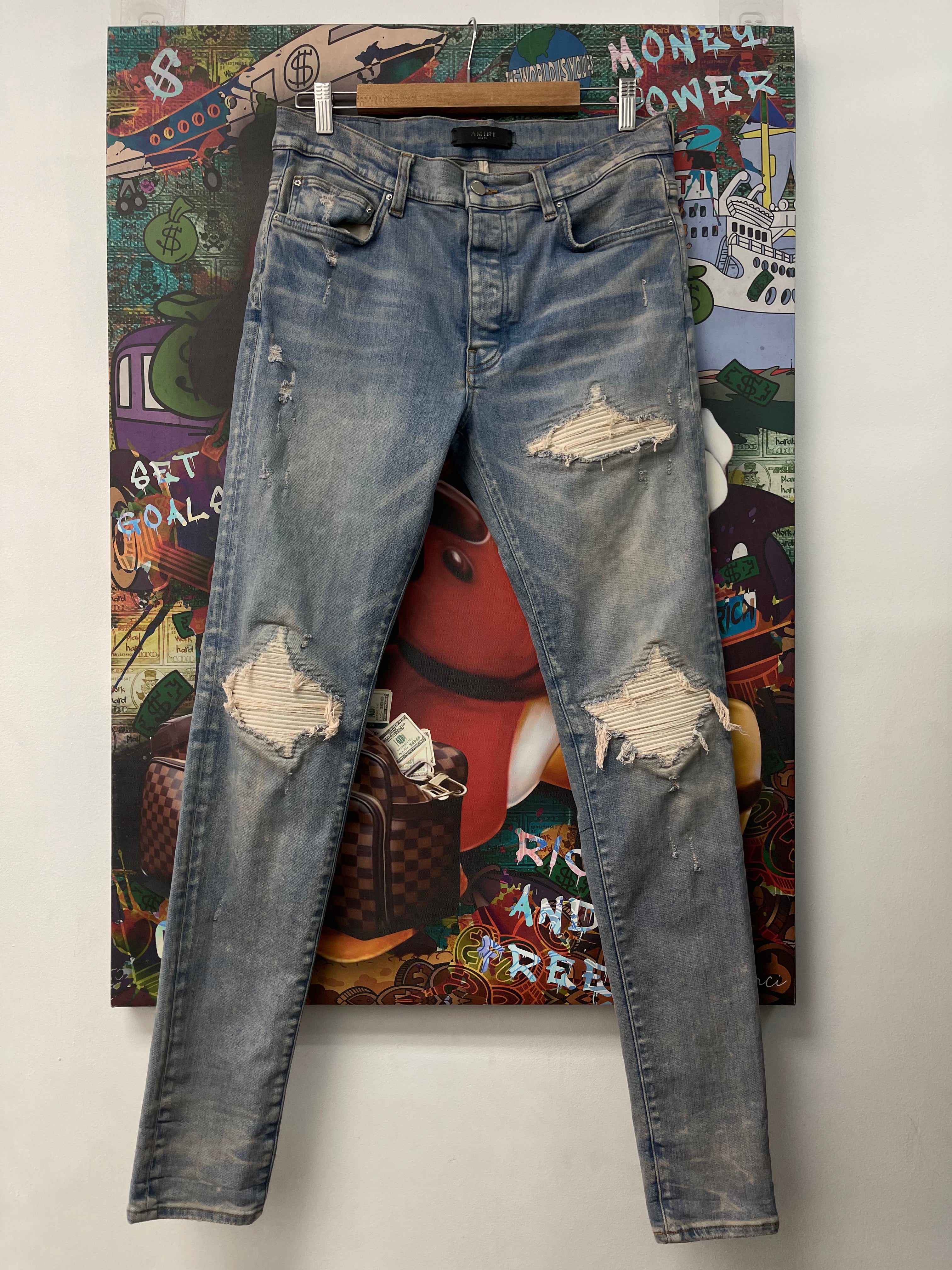 Amiri Light Wash White Patch MX1 Jeans