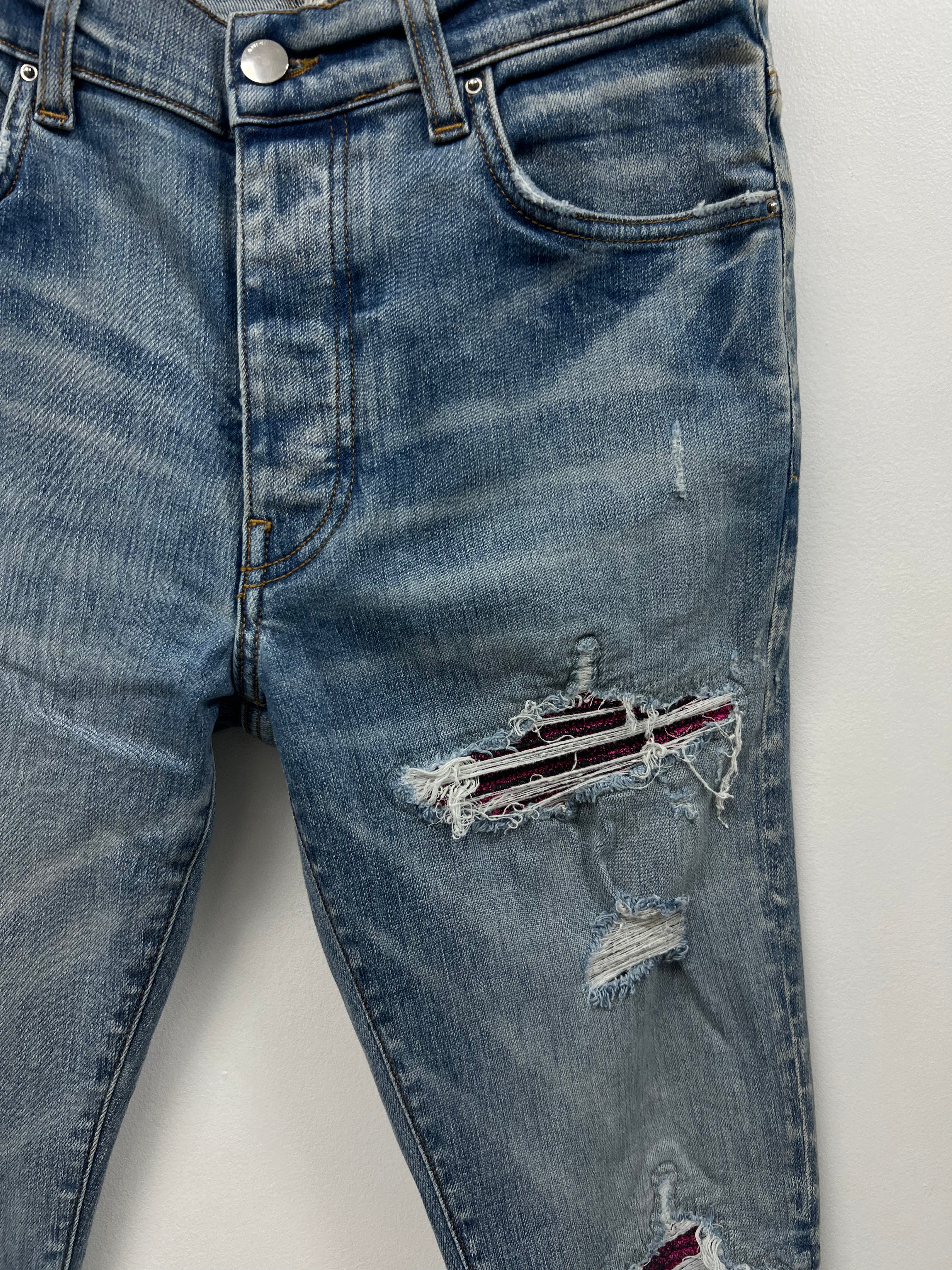 Amiri MX1 Light Wash Pink Crackle Patch Jeans