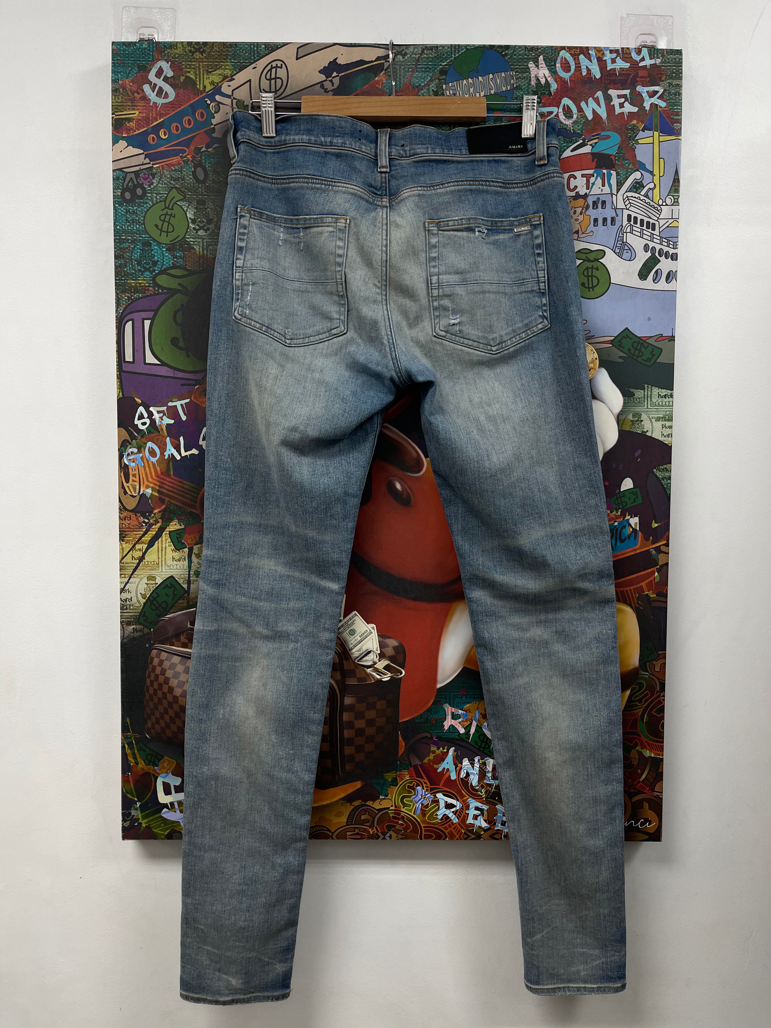Amiri MX1 Light Wash Brown Suede Patch Jeans