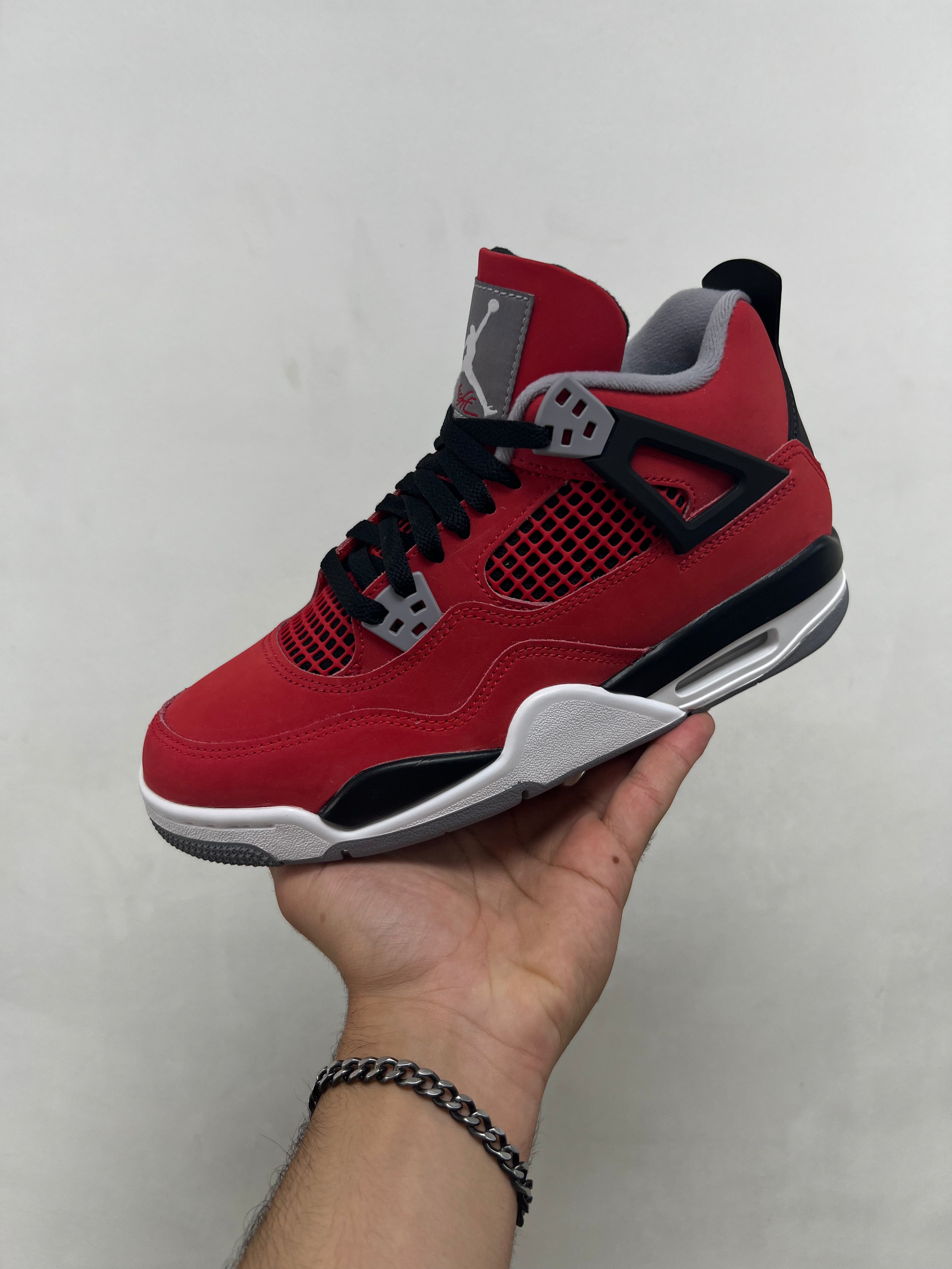 Nike Jordan 4 Toro Sneakers