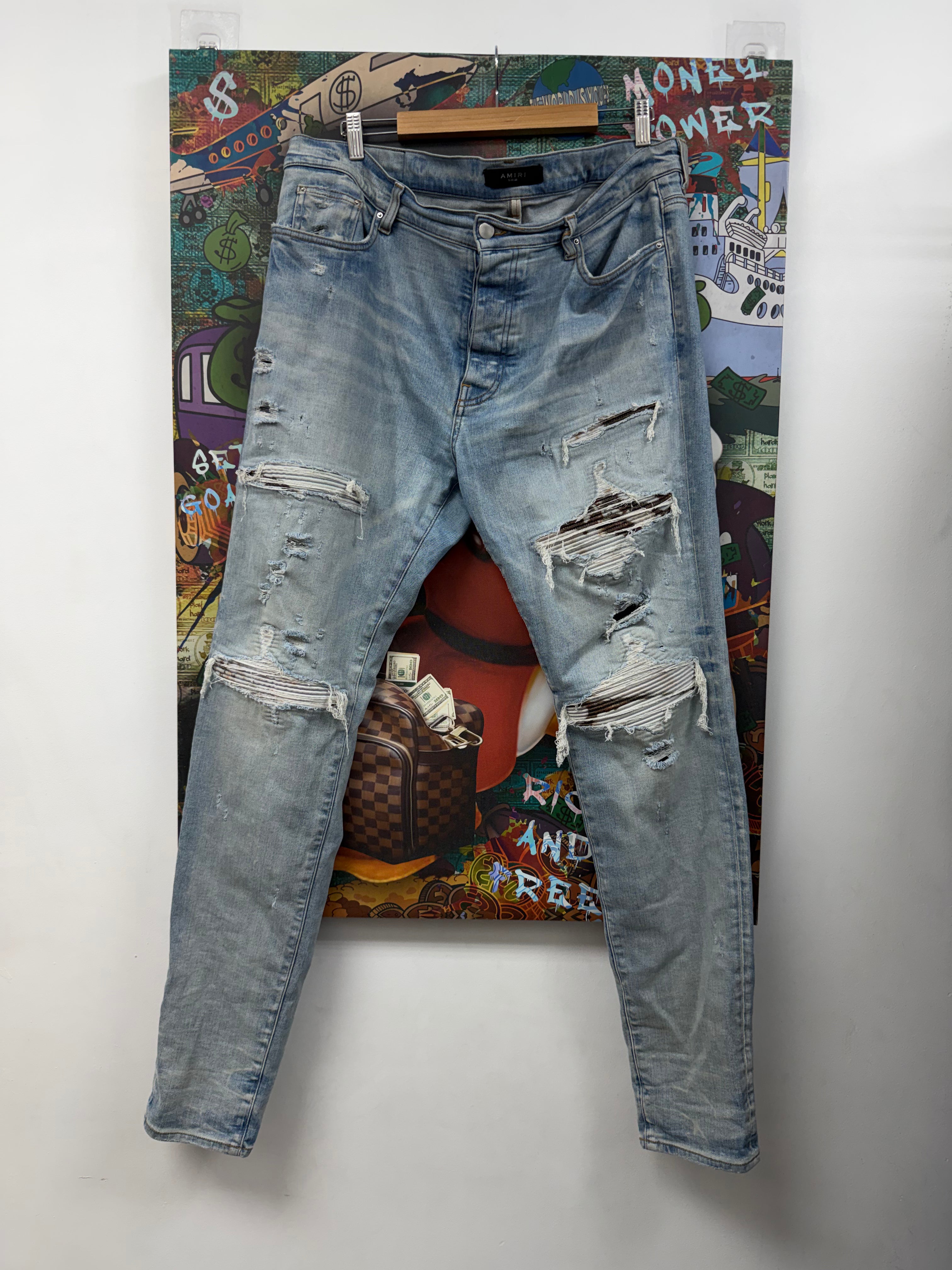 Amiri MX1 Light Wash Marble Patch Jeans