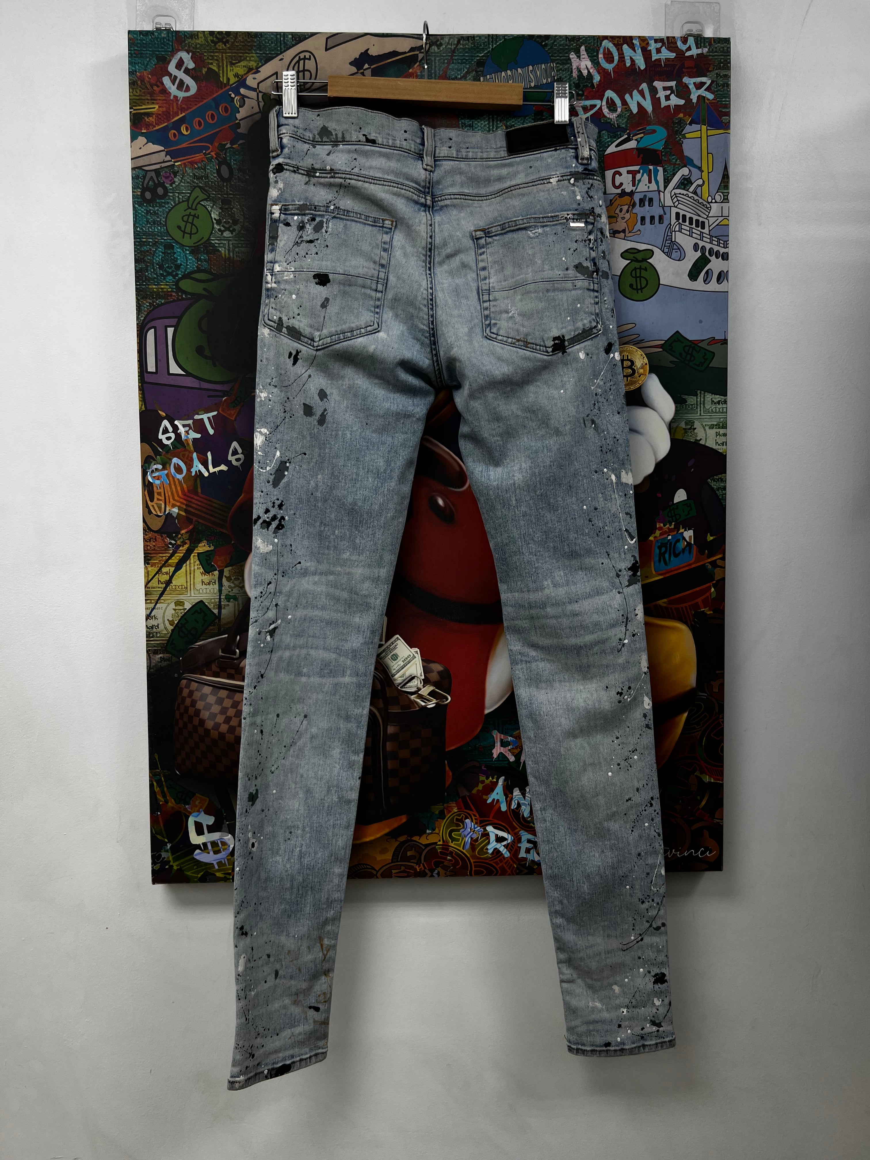Amiri MX1 Light Wash Denim Paint Splatter Patch Jeans (Repaired)