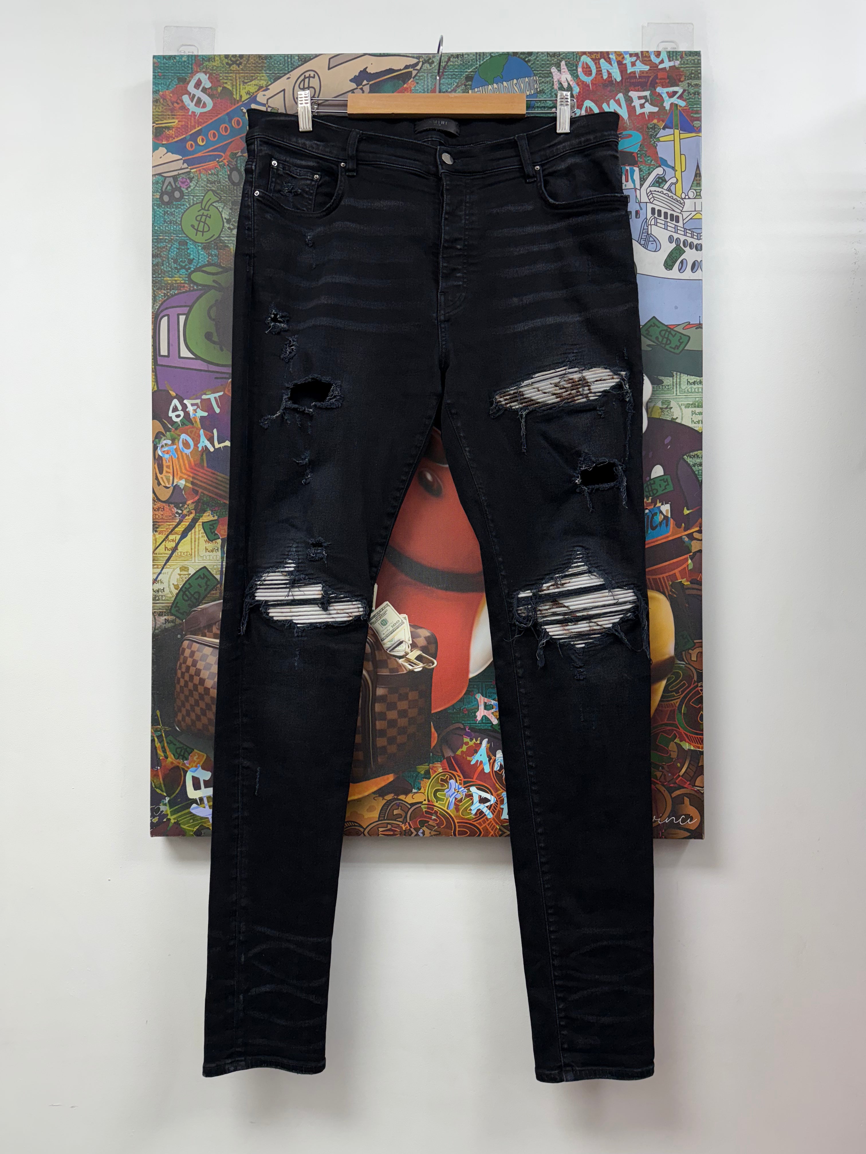 Amiri MX1 Black Wash Marble Patch Jeans