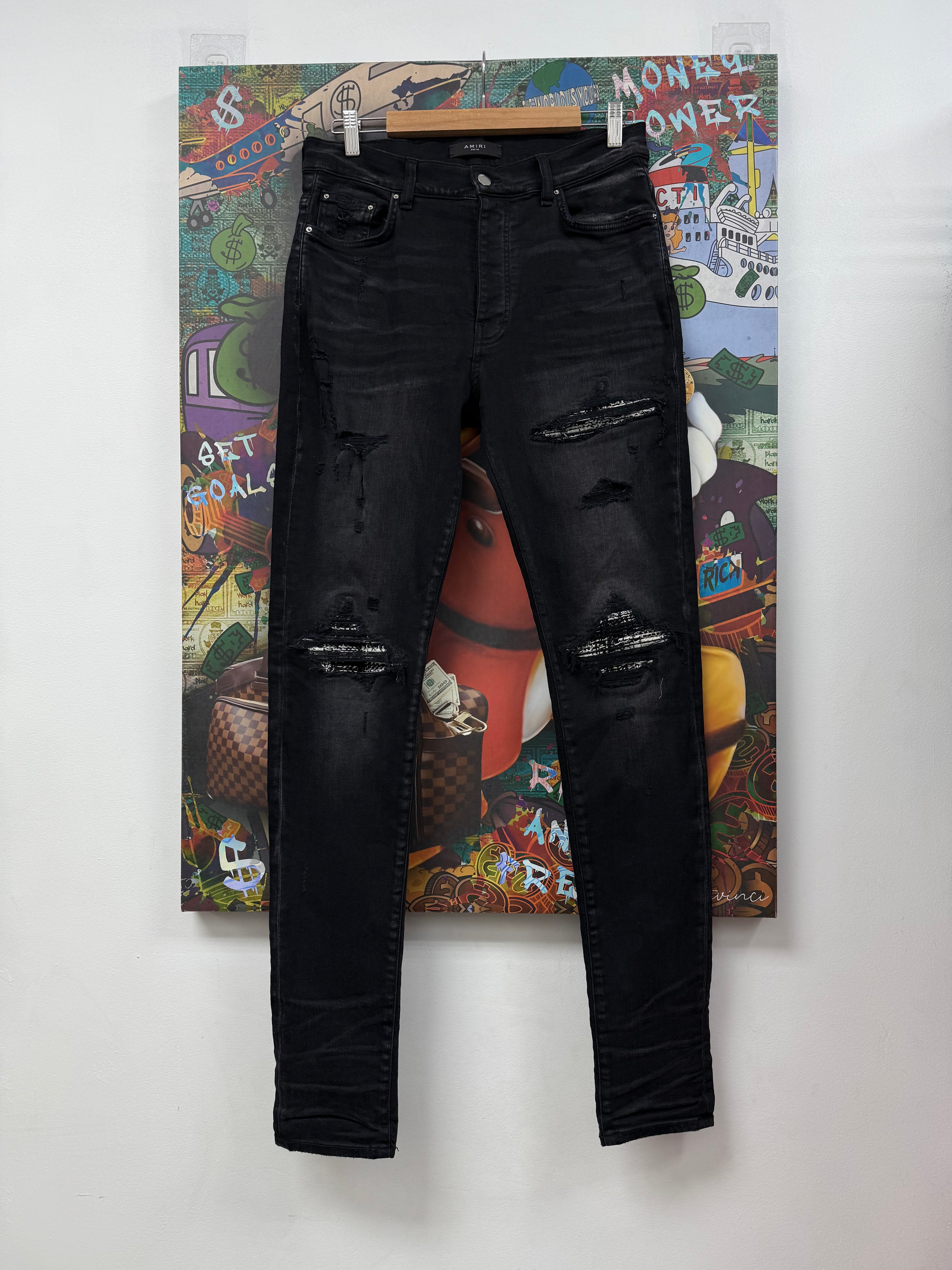 Amiri MX1 Black Wash Boucle Patch Jeans