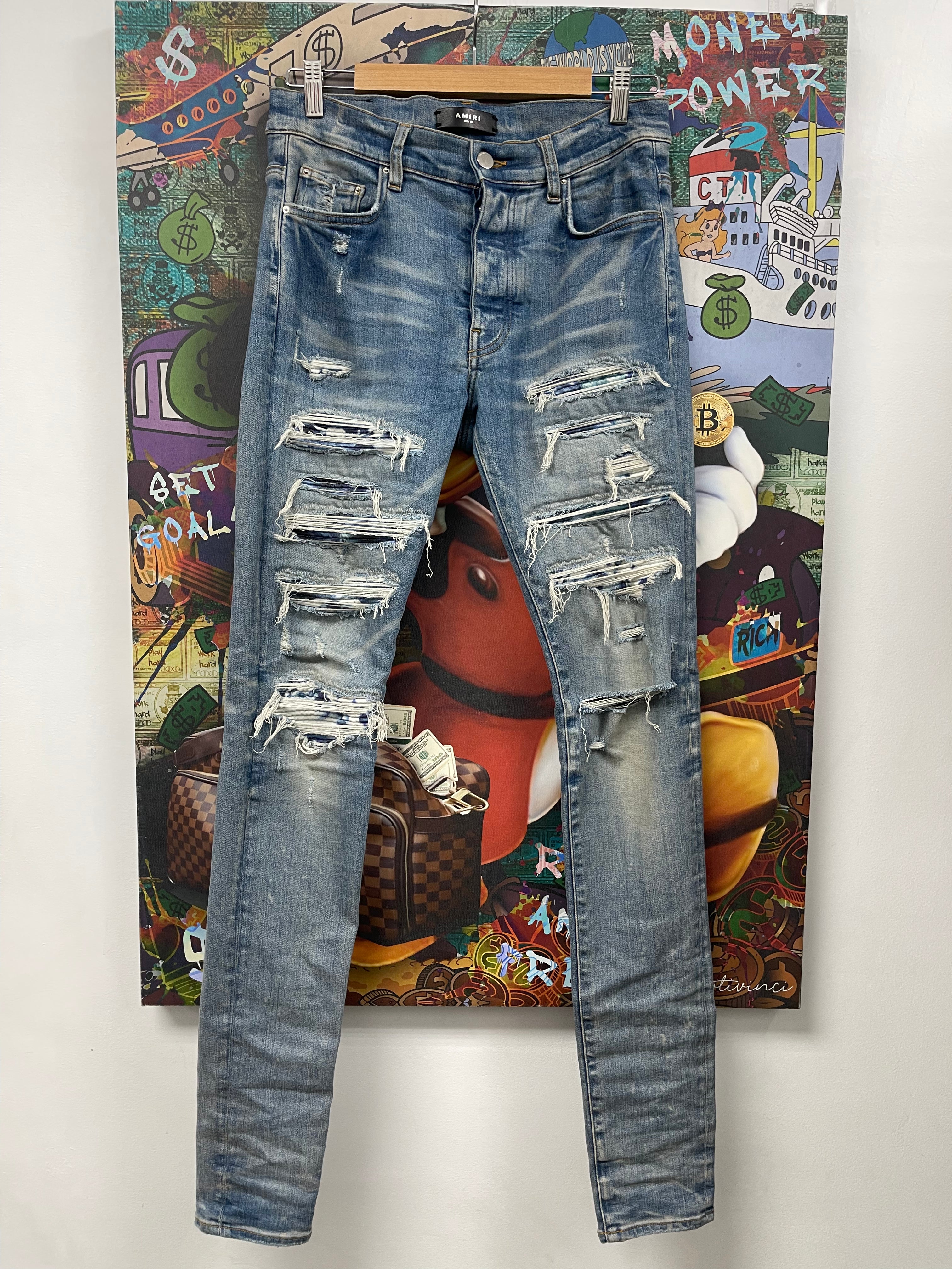 Amiri Light Wash Tie Dye Thrasher Jeans