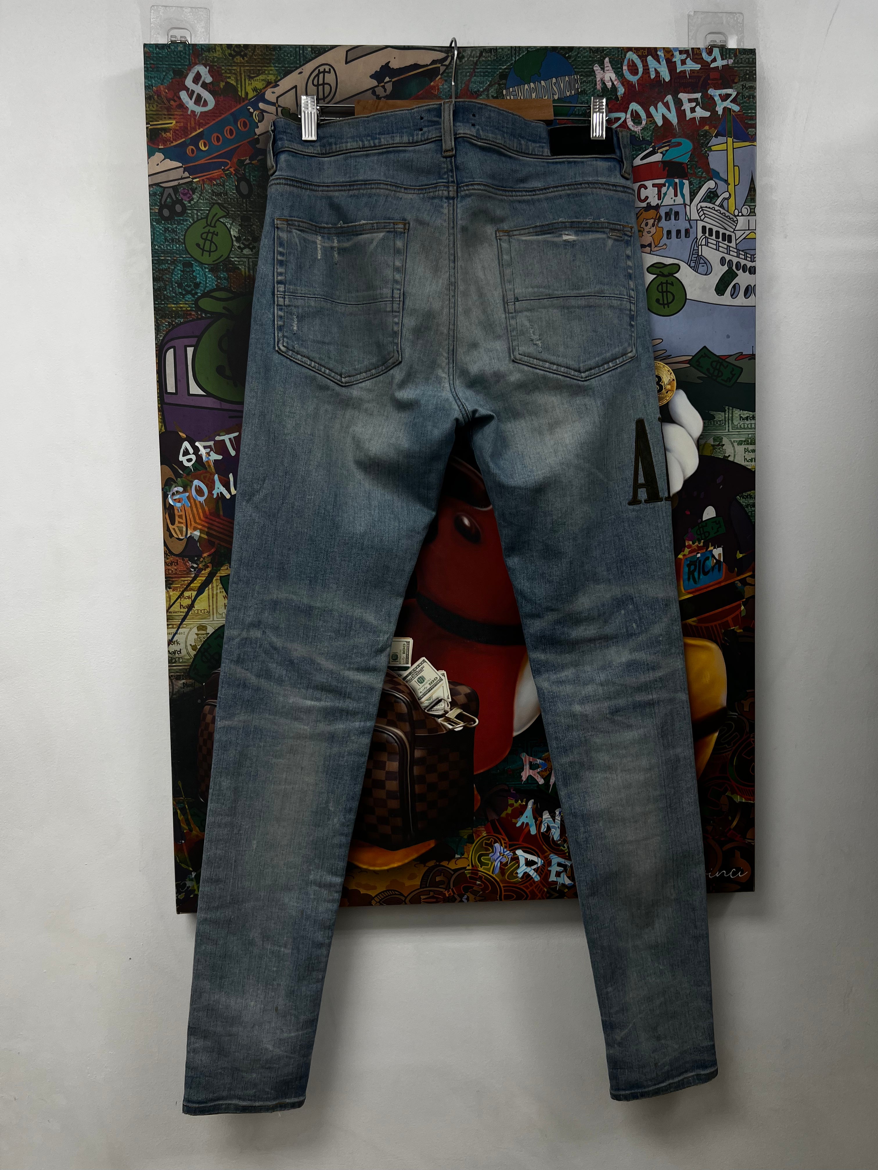 Amiri Light Wash Camo Patch Side Logo Jeans
