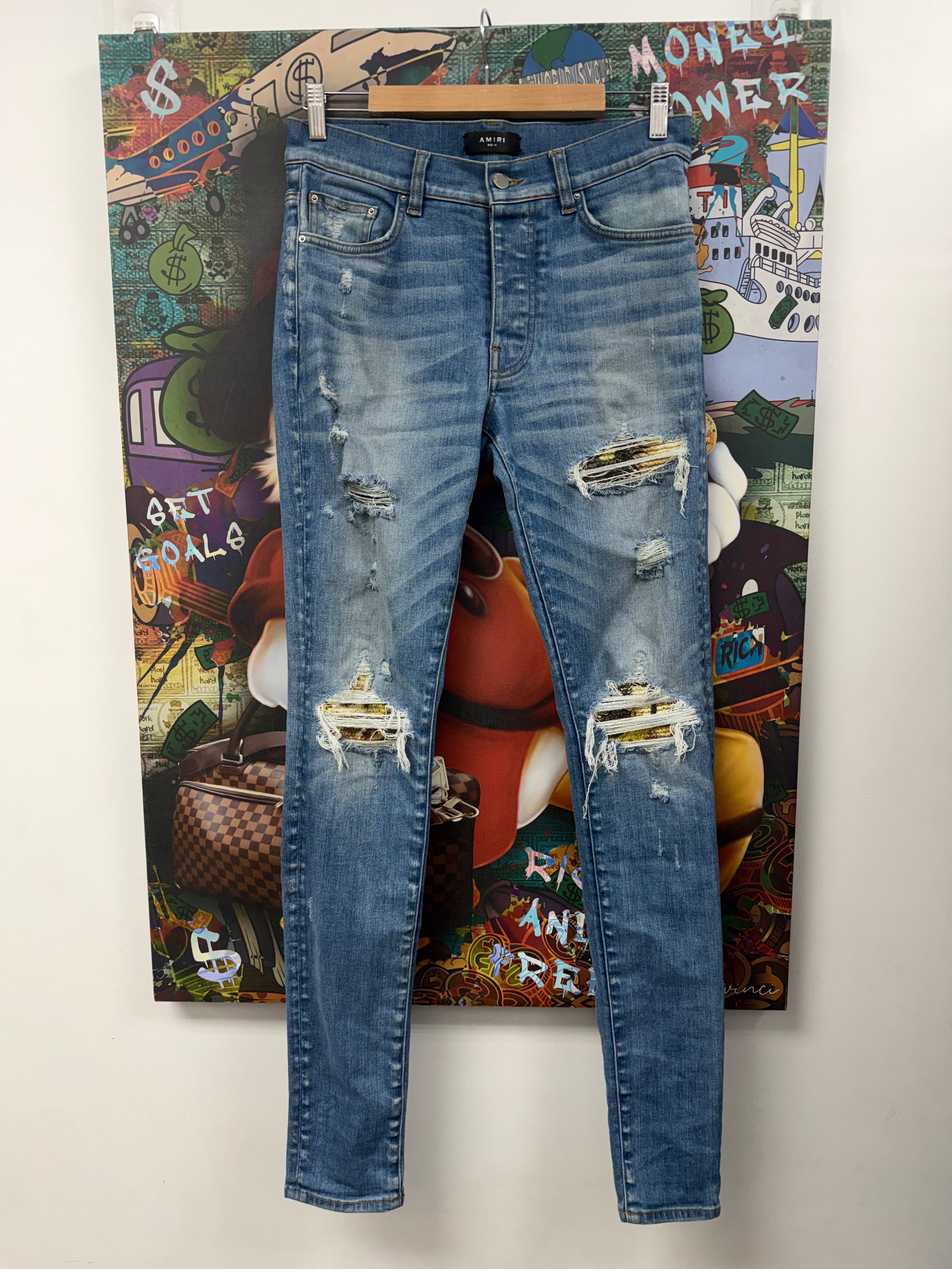 Amiri MX1 Light Wash Aloha Patch Jeans