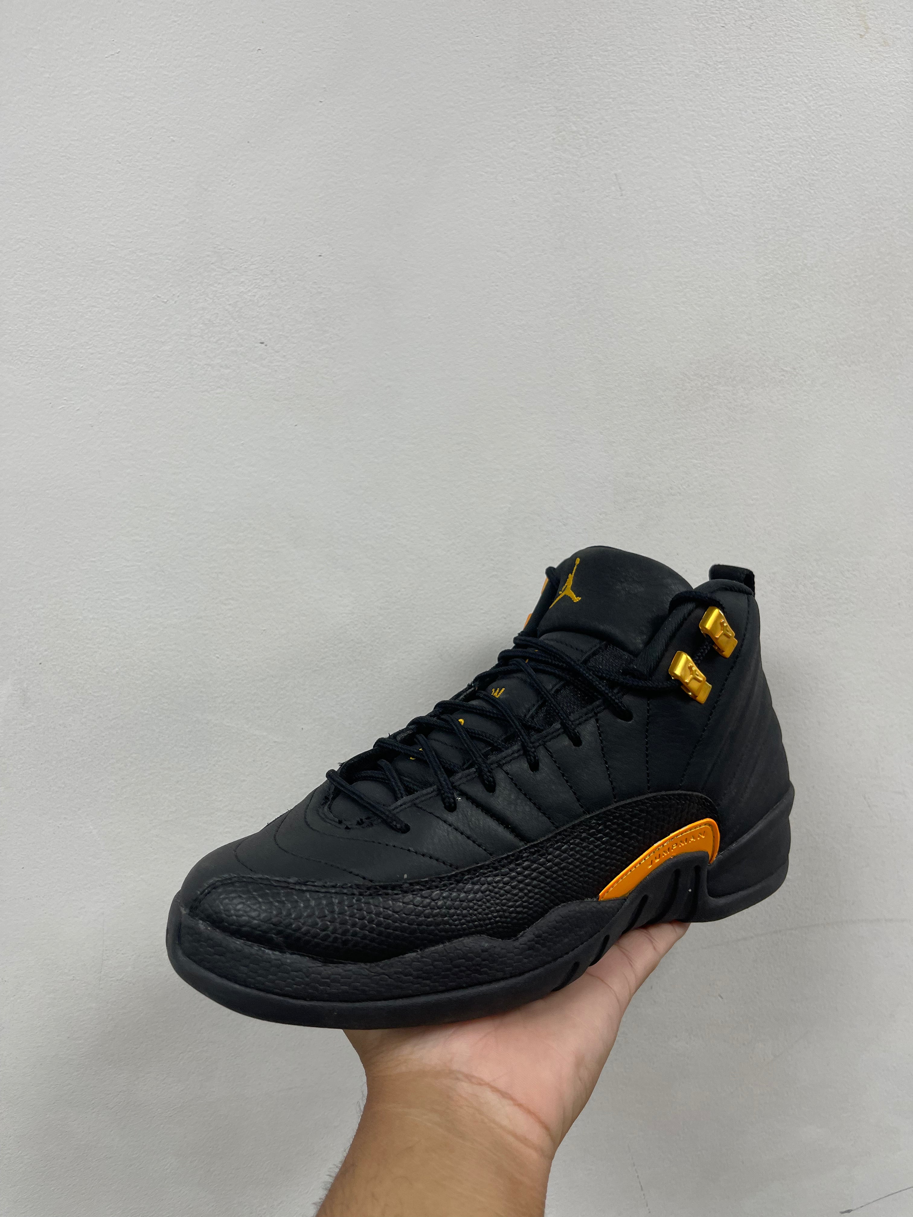 Jordan 12 Black Taxi Sneakers