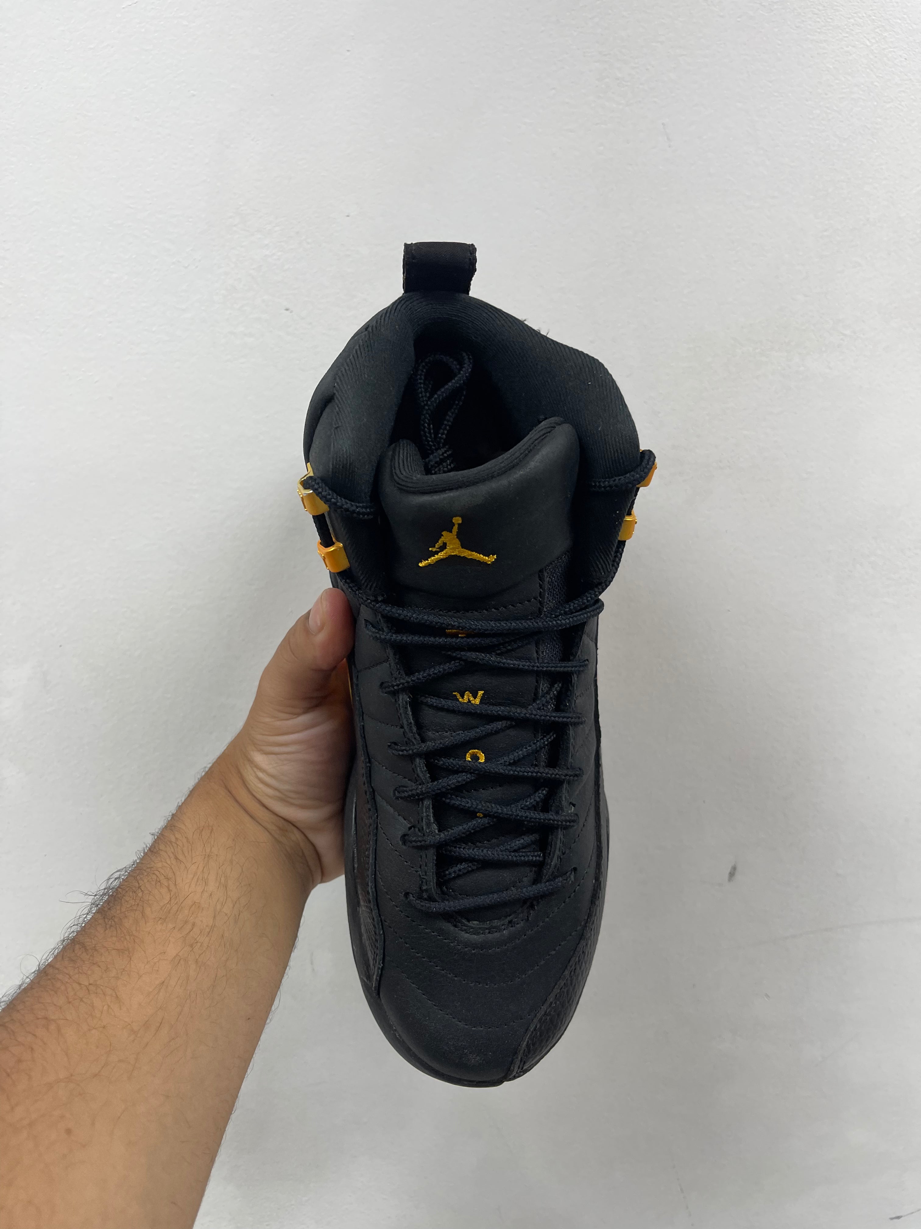 Jordan 12 Black Taxi Sneakers