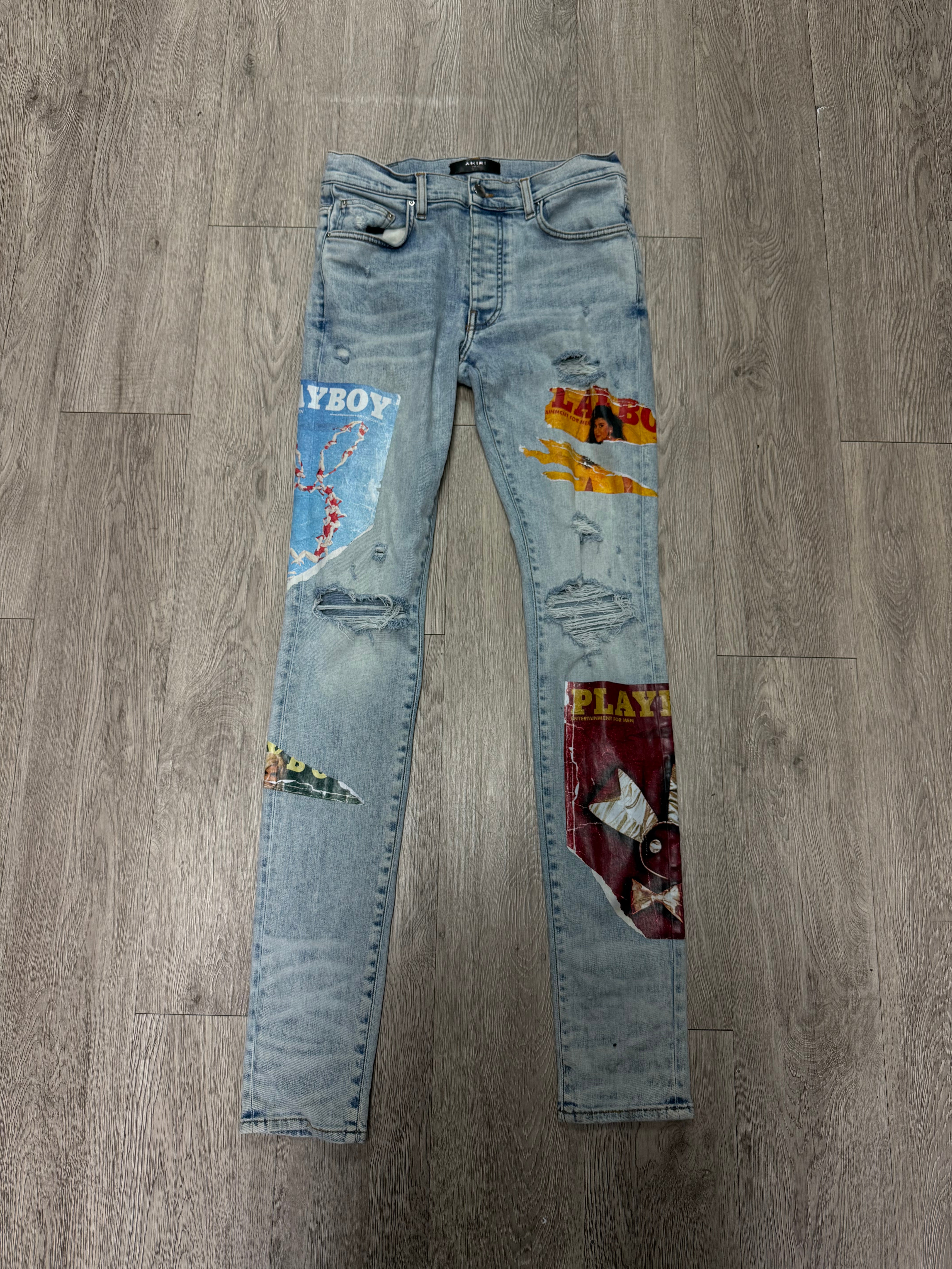 Amiri Light Wash Playboy Magazine Jeans