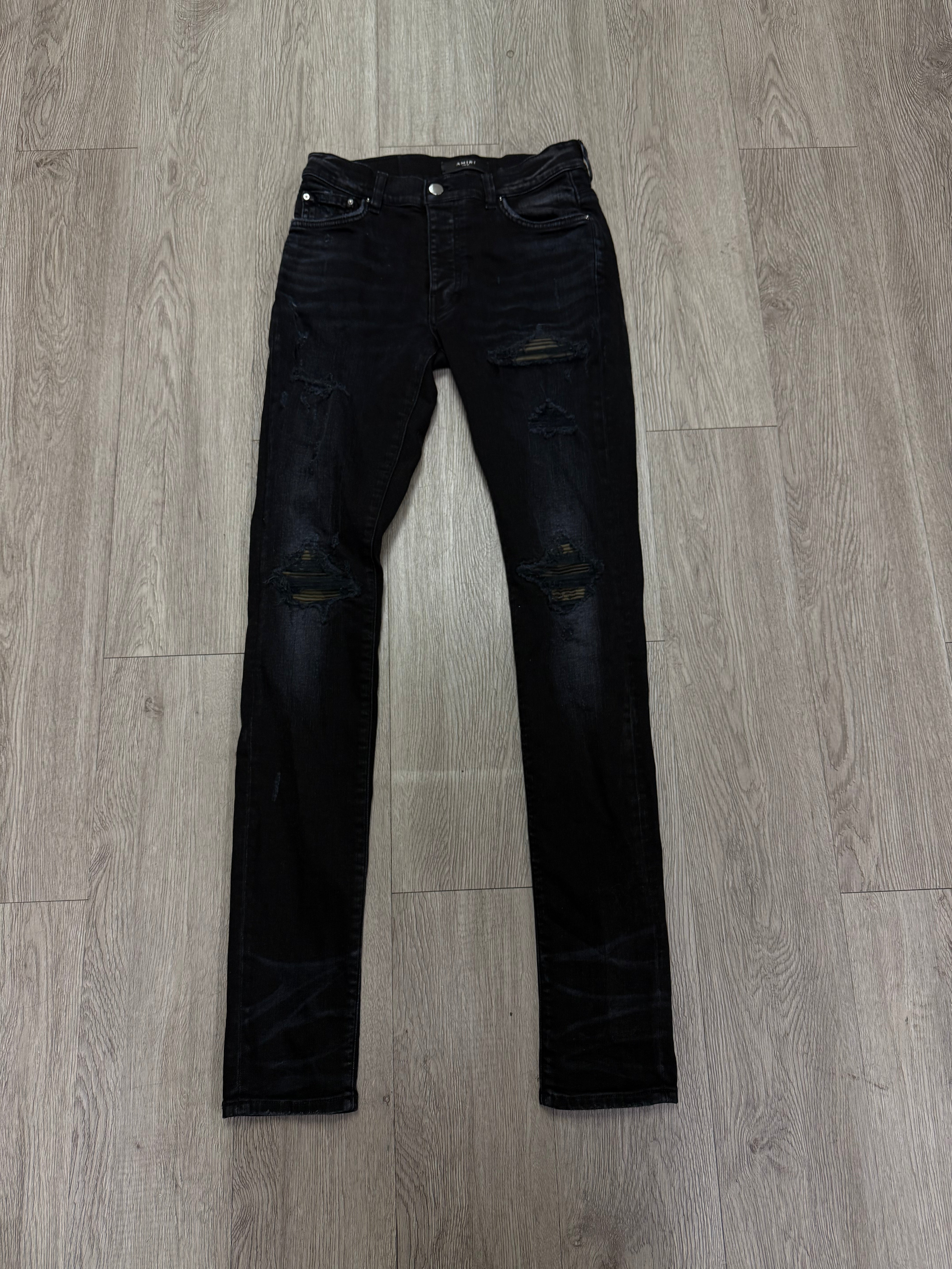 Amiri MX1 Black Wash Camo Patch Jeans