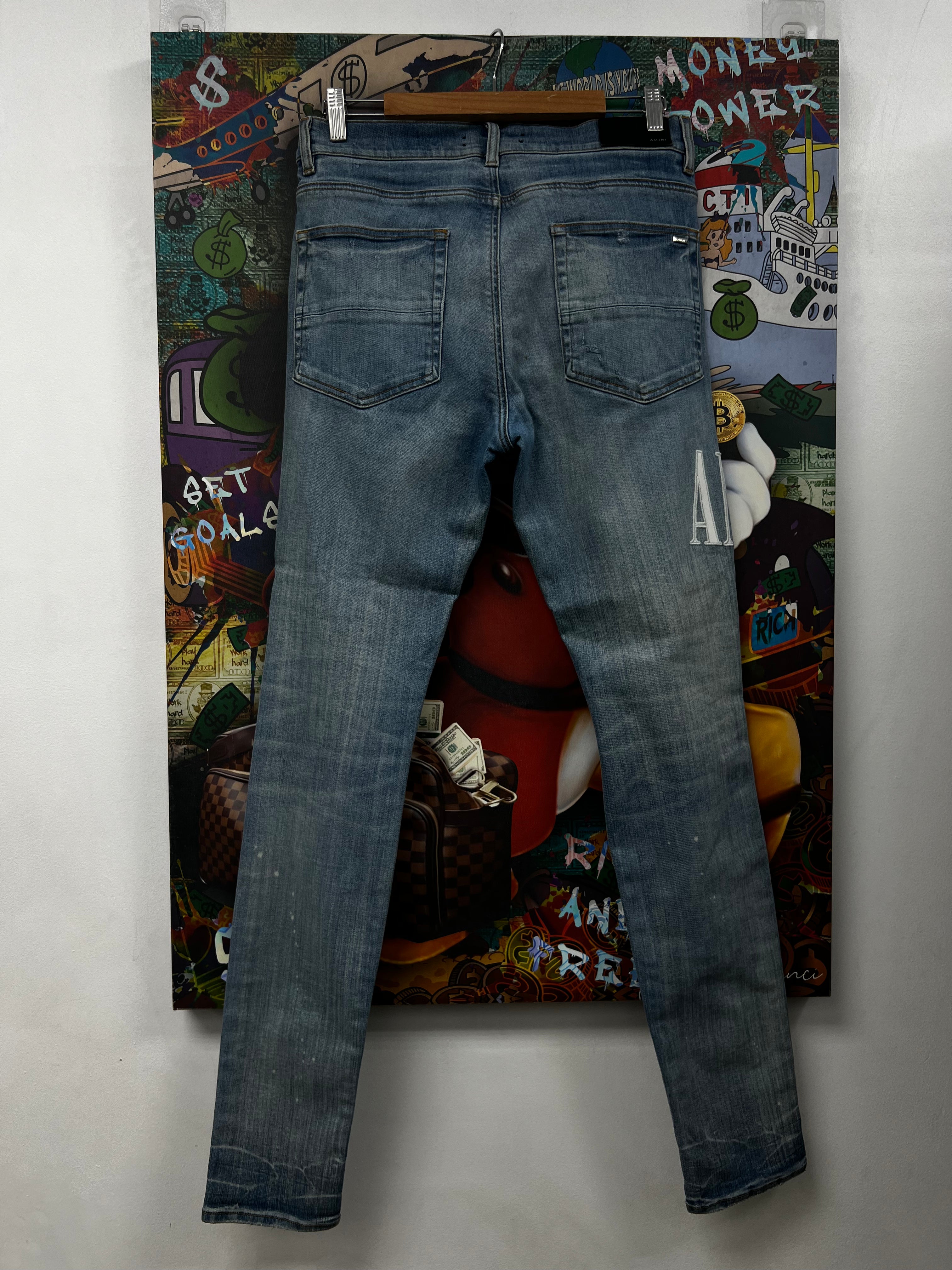 Amiri Light Wash White Side Logo Jeans